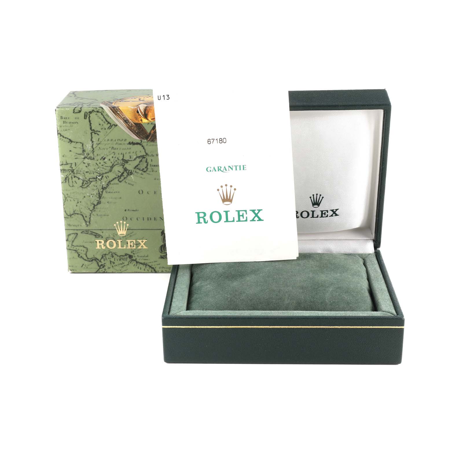 The image shows the box, inner cushion, and guarantee booklet of a Rolex Oyster Perpetual 67180 Women's Stainless Steel Blue Dial 67180 Women's Stainless Steel Blue Dial watch.