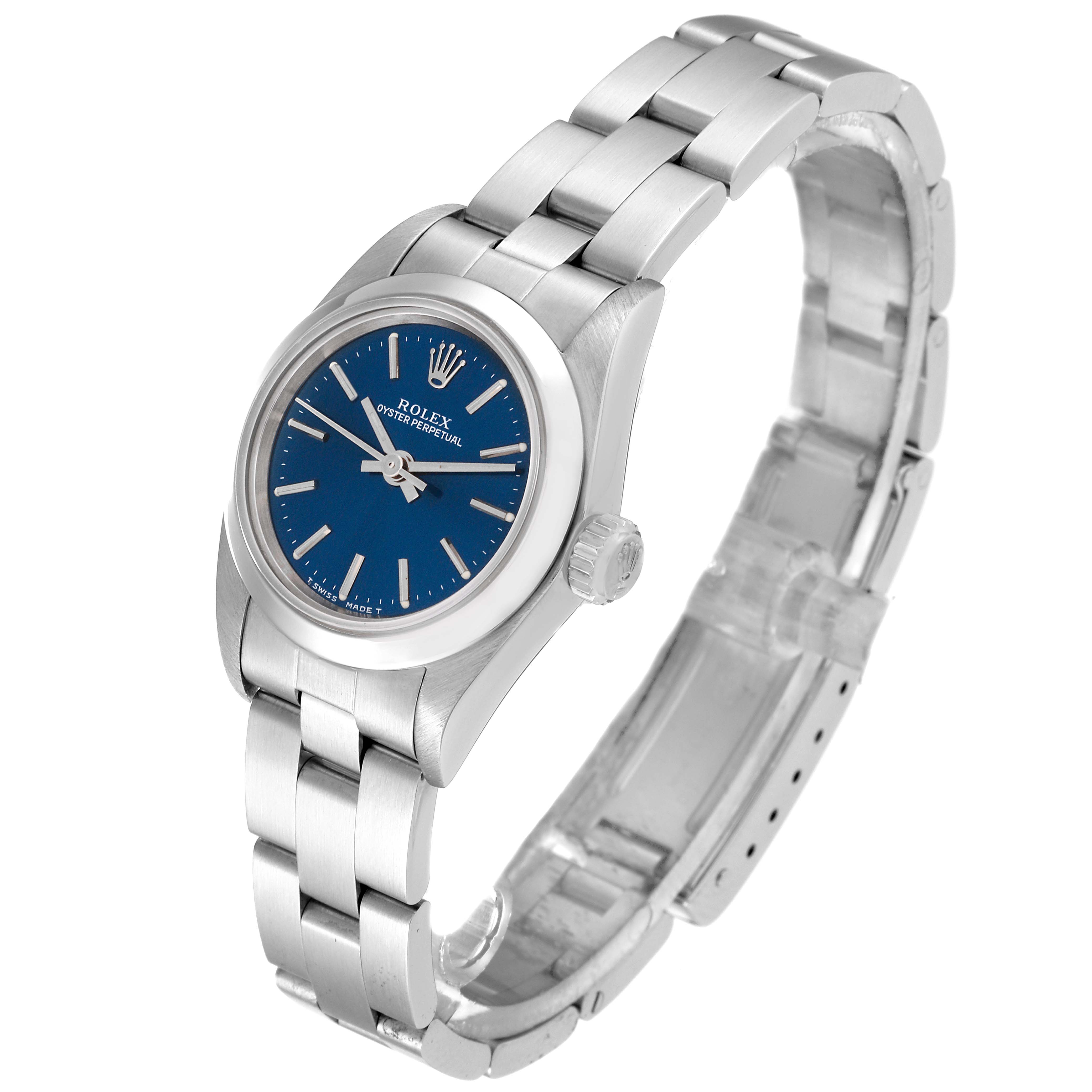 The image shows a Rolex Oyster Perpetual 67180 Women's Stainless Steel Blue Dial 67180 Women's Stainless Steel Blue Dial watch at an angled side view, highlighting its blue dial, case, and bracelet.