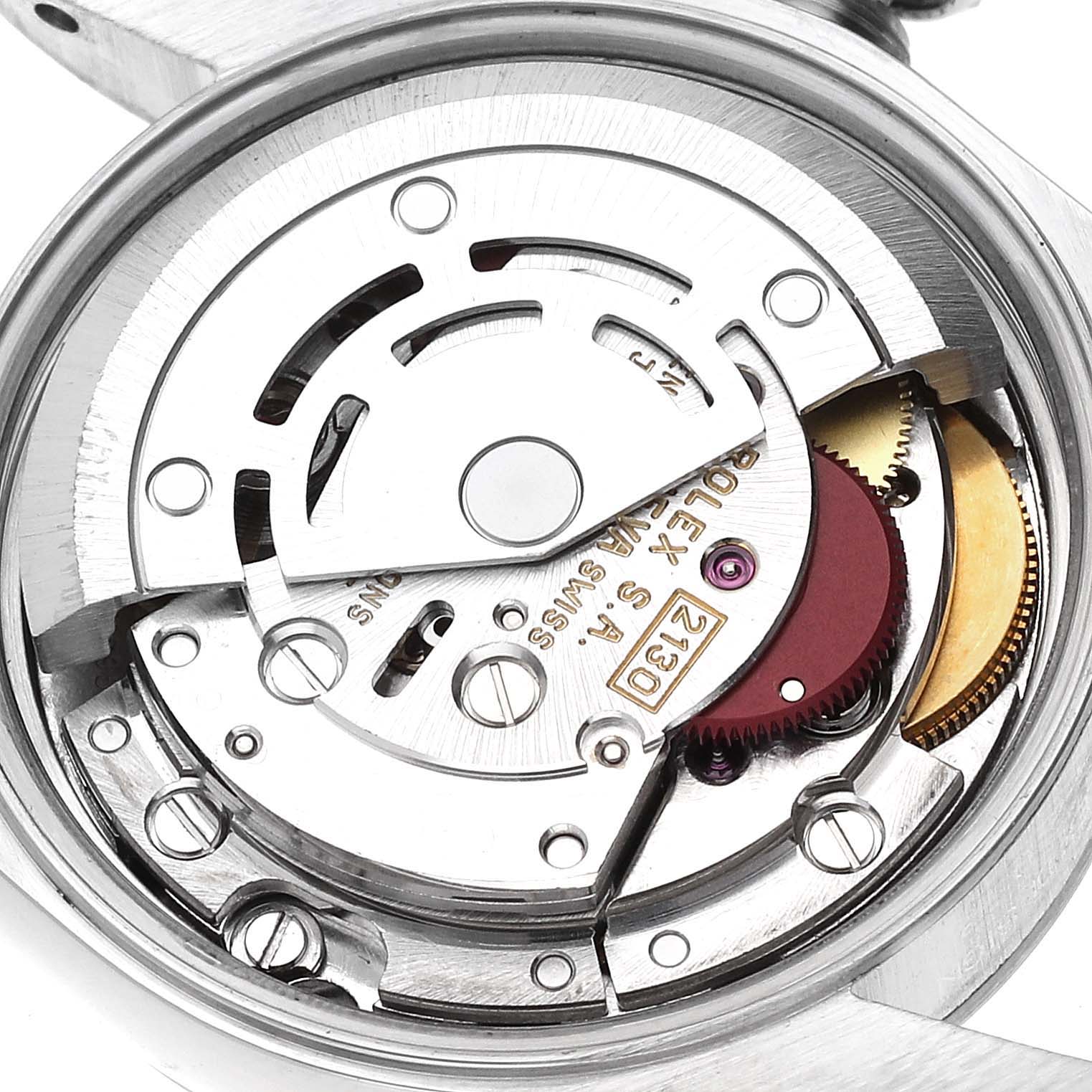 The image shows the internal movement mechanism of a Rolex Oyster Perpetual 67180 Women's Stainless Steel Blue Dial 67180 Women's Stainless Steel Blue Dial watch taken from a rear angle.