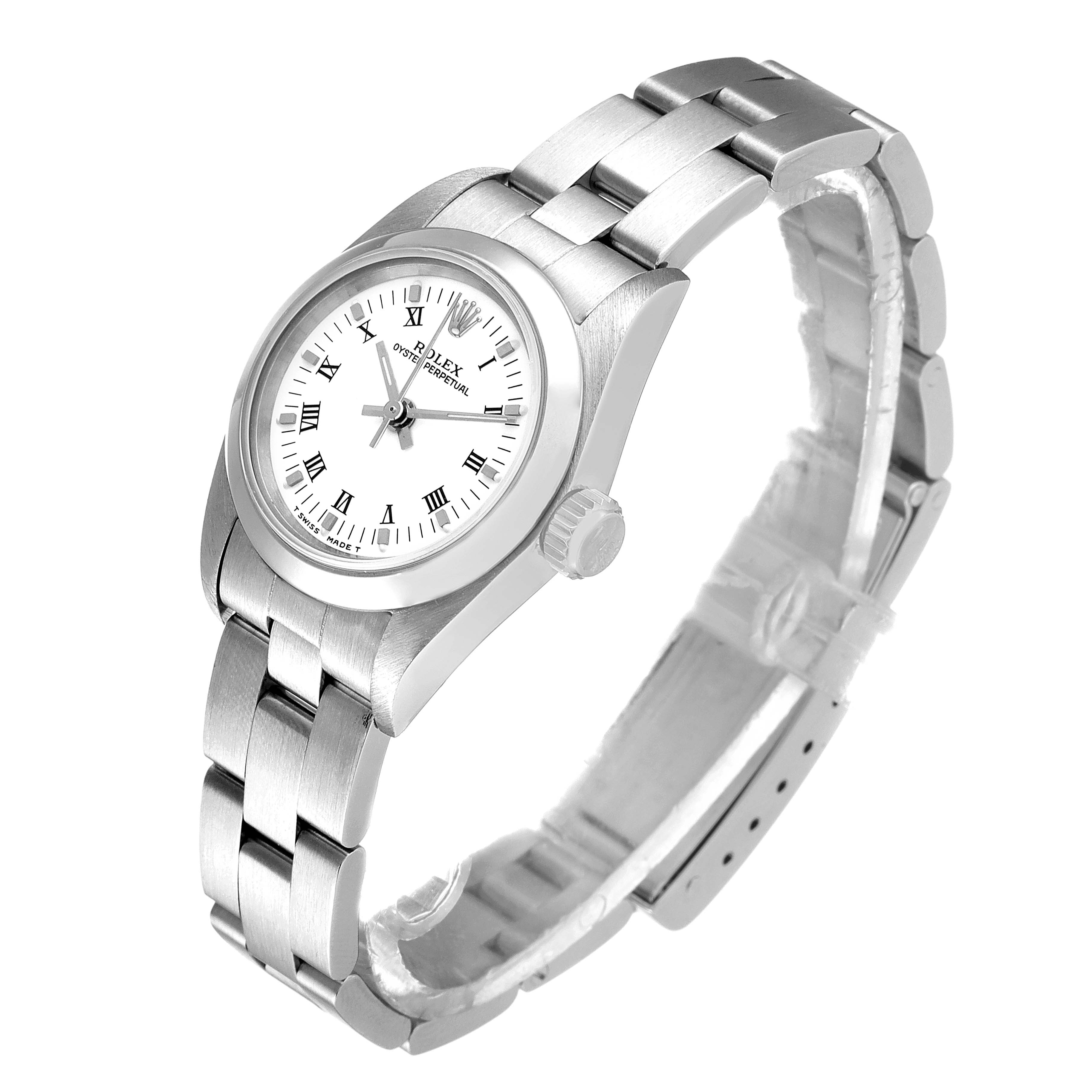 The Rolex Oyster Perpetual 67180 Women's Stainless Steel White Dial 67180 Women's Stainless Steel White Dial watch is shown at an angle displaying the face, bezel, crown, and bracelet.