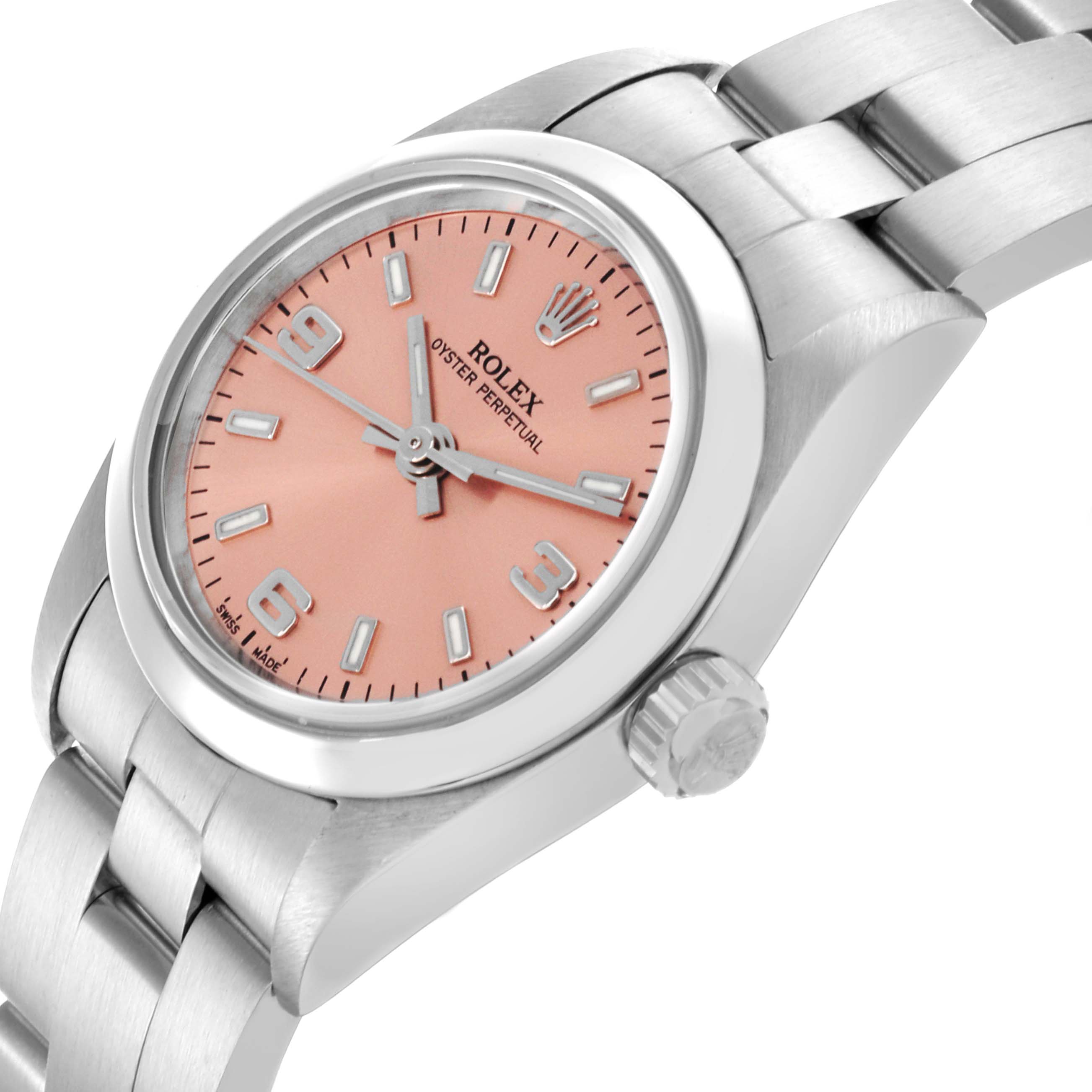 The Rolex Oyster Perpetual 76080 Women's Stainless Steel Pink Dial 76080 Women's Stainless Steel Pink Dial watch is shown at an angled view highlighting the face, crown, and bracelet.