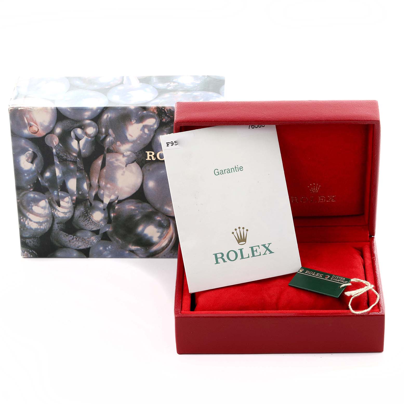 The image shows the Rolex Oyster Perpetual 76080 Women's Stainless Steel Pink Dial 76080 Women's Stainless Steel Pink Dial box, warranty card, and a tag, viewed from the front angle.