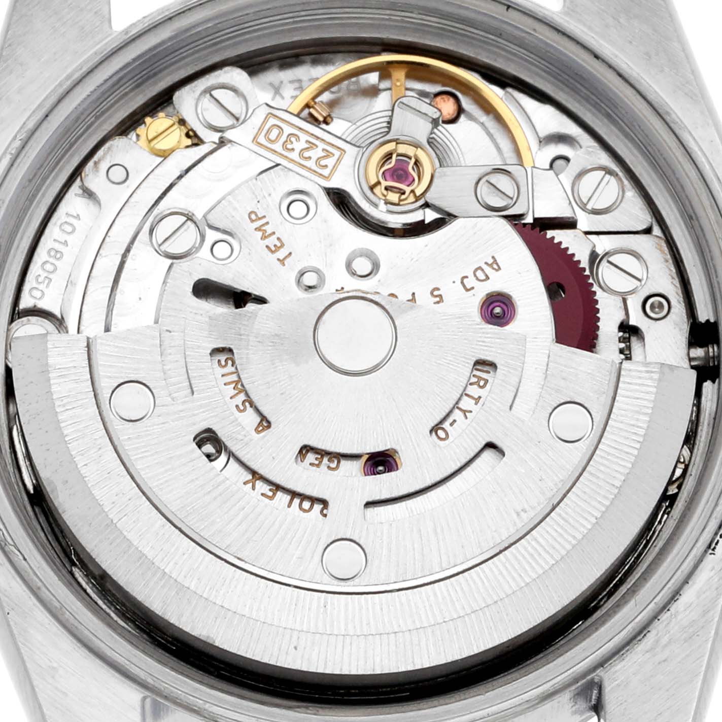 The image shows a close-up of the movement mechanism of a Rolex Oyster Perpetual 76080 Women's Stainless Steel Pink Dial 76080 Women's Stainless Steel Pink Dial watch from the back.