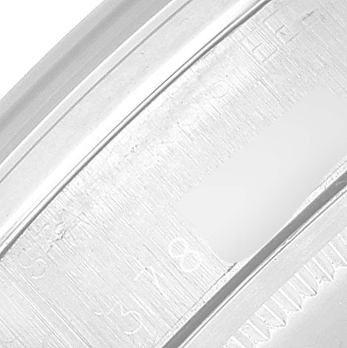 This image shows a close-up view of the inner case back of the Rolex Vintage Collection 6694 Men's Stainless Steel Black Dial 6694 Men's Stainless Steel Black Dial model watch.