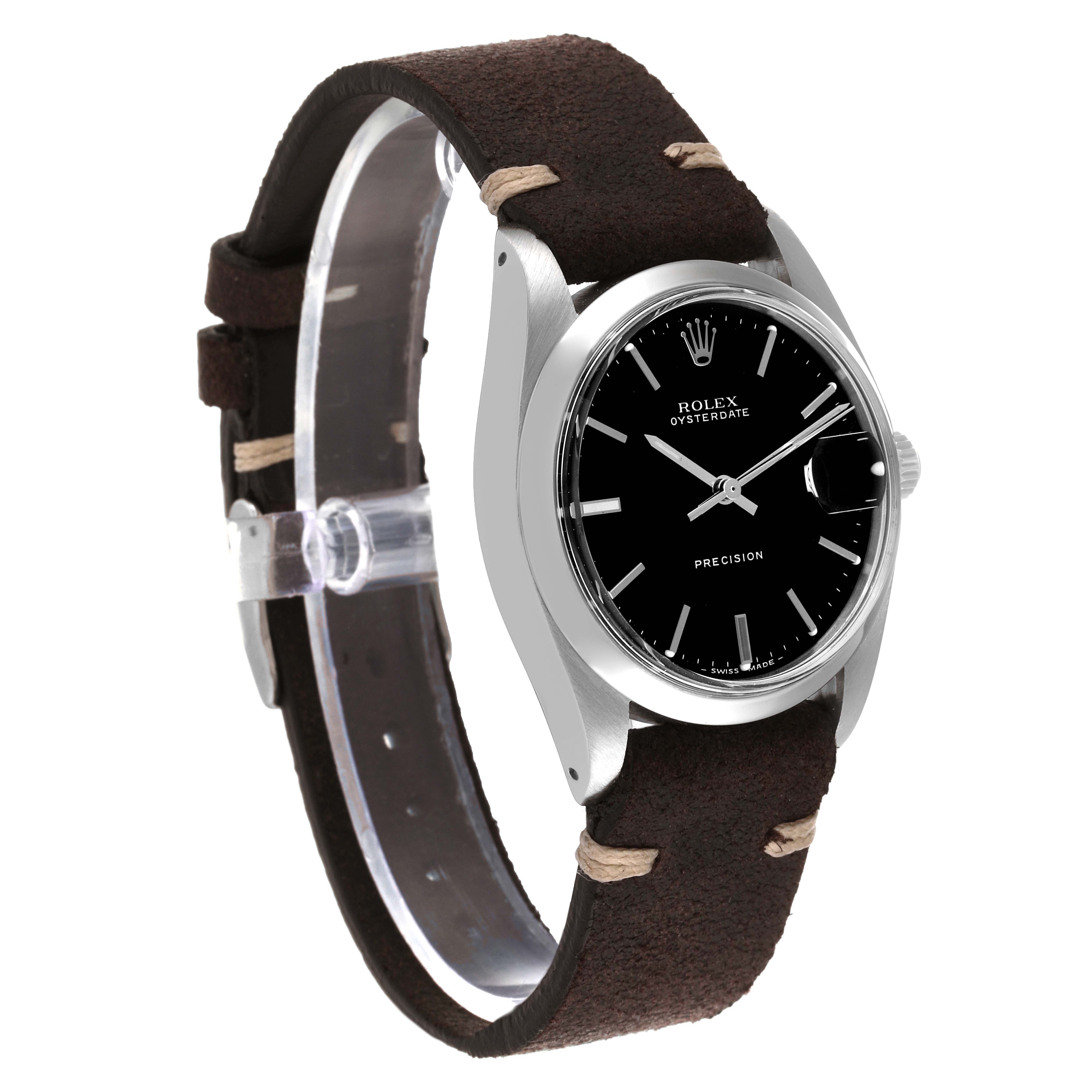 The Rolex Vintage Collection 6694 Men's Stainless Steel Black Dial 6694 Men's Stainless Steel Black Dial model watch is shown at a three-quarter angle, displaying its black dial, silver case, and brown leather strap.