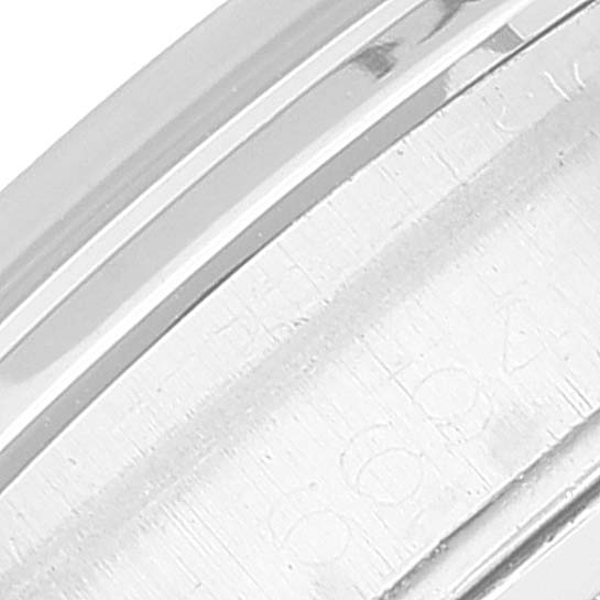 A close-up of the bezel and case of a Rolex Vintage Collection 6694 Men's Stainless Steel Brown Dial 6694 Men's Stainless Steel Brown Dial watch.