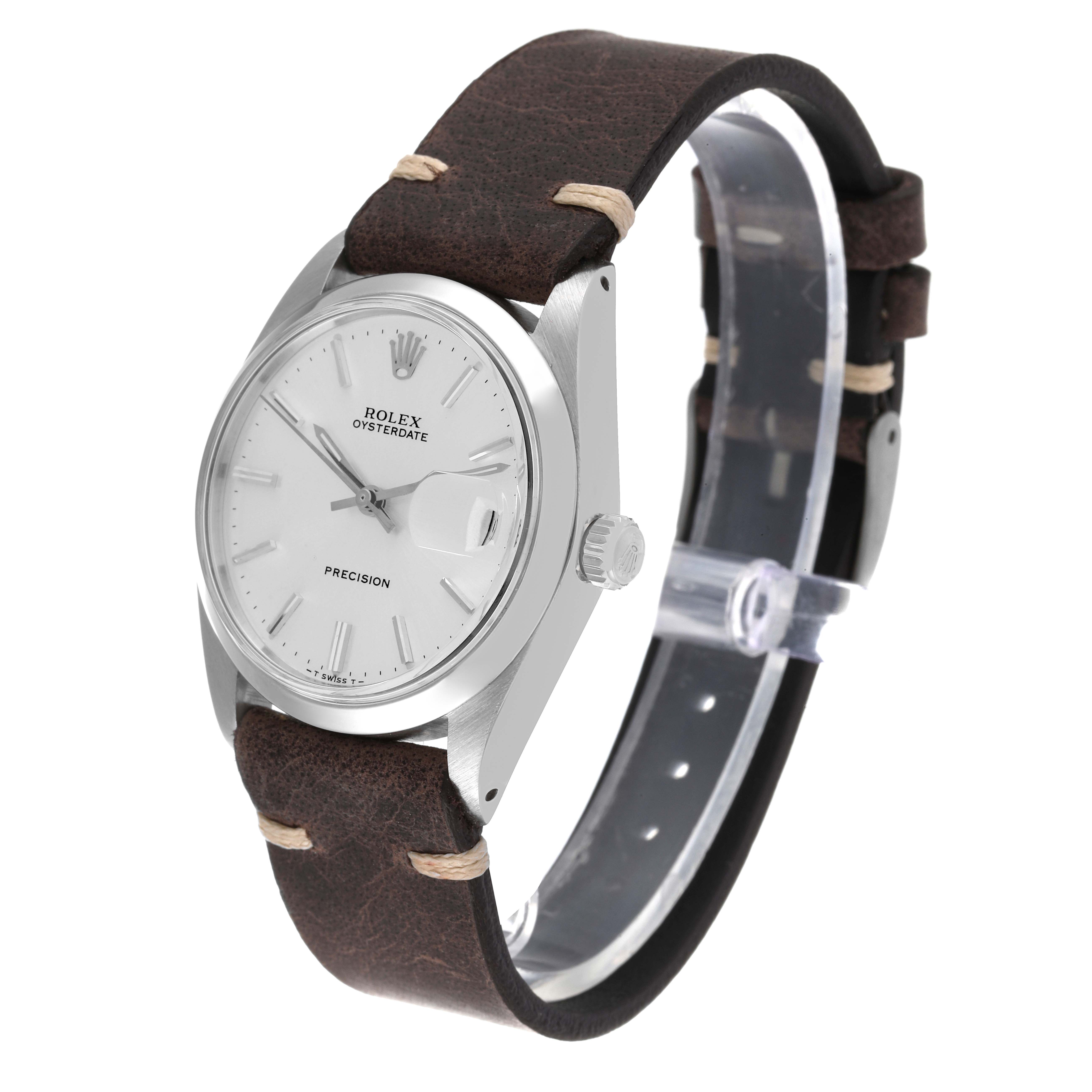 The Rolex Vintage Collection 6694 Men
s Stainless Steel Silver Dial 6694 Men
s Stainless Steel Silver Dial Oysterdate Precision watch is shown at a three-quarter angle, highlighting its dial, crown, and leather strap.