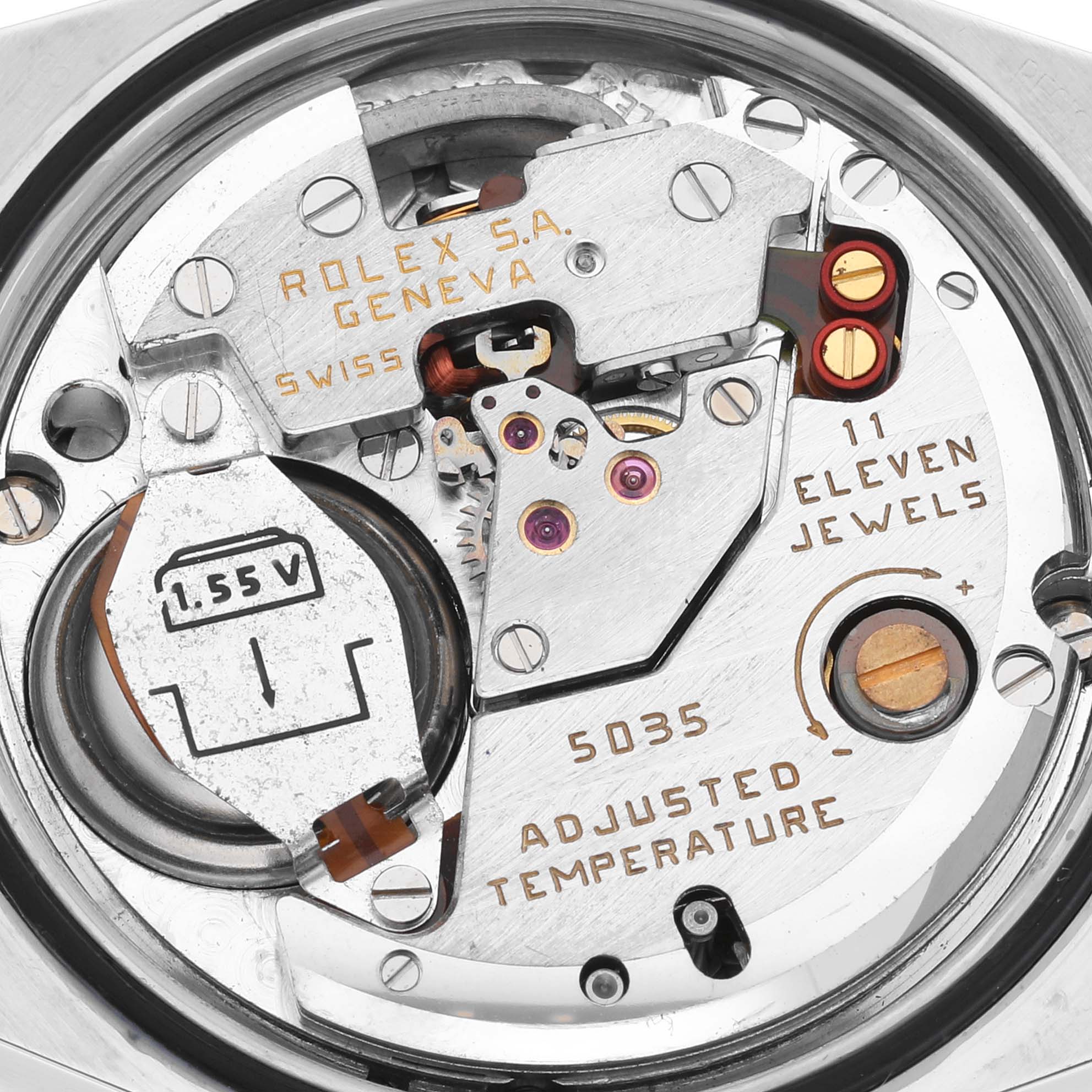 The image shows a close-up of the movement and inner components of a Rolex Oysterquartz 17013 Men's Steel and Gold (two tone) Champagne Dial 17013 Men's Steel and Gold (two tone) Champagne Dial watch.