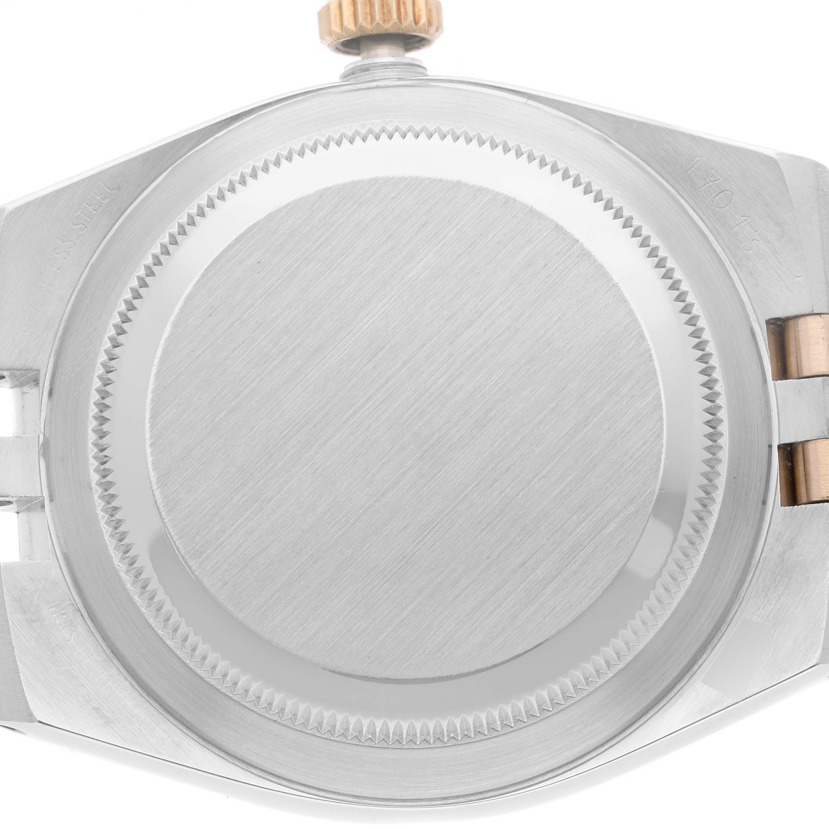 The image shows the case back of a Rolex Oysterquartz 17013 Men's Steel and Gold (two tone) Champagne Dial 17013 Men's Steel and Gold (two tone) Champagne Dial watch from a top-down angle.