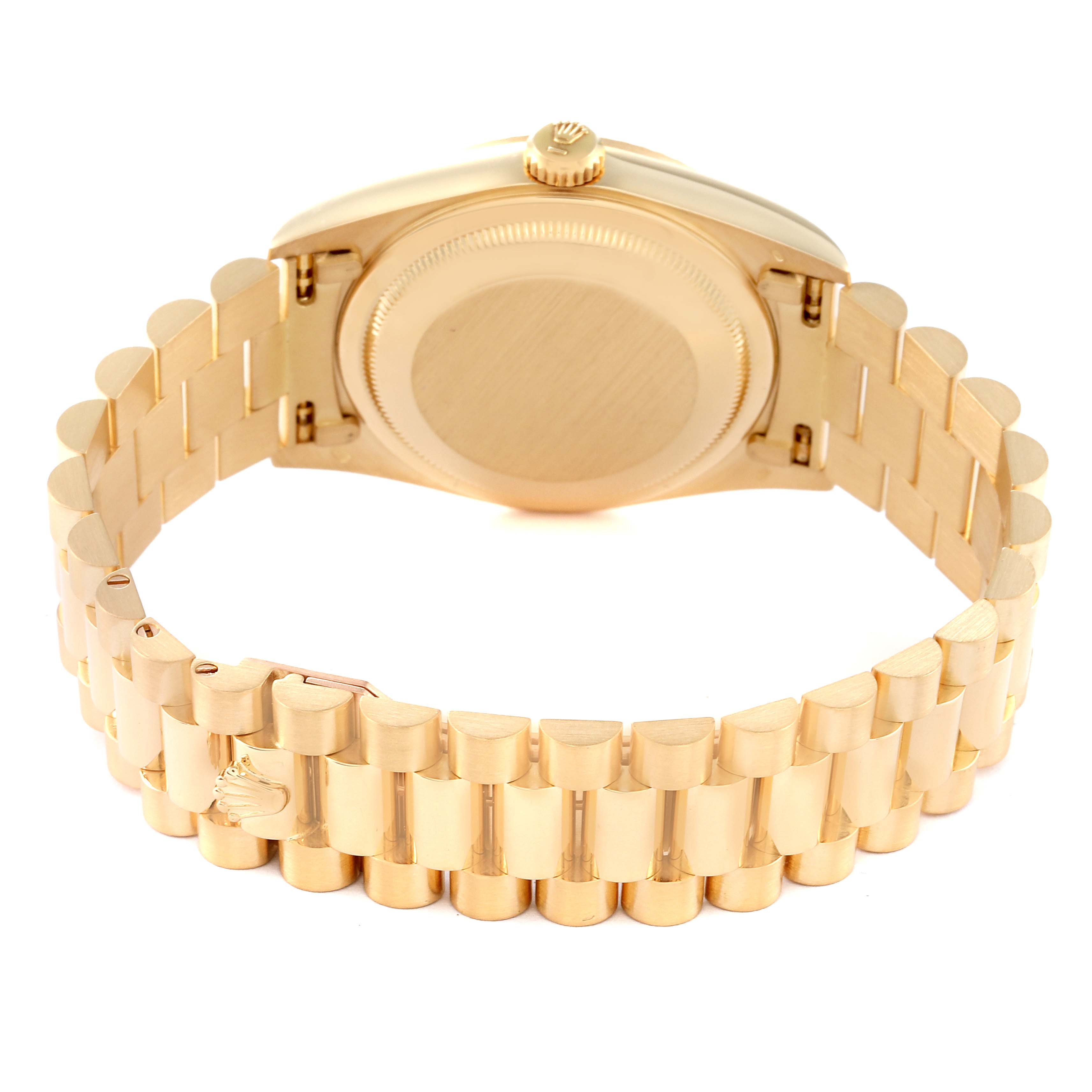 The image shows the rear case and bracelet of a Rolex President 18238LR Men's Yellow Gold Champagne Dial 18238LR Men's Yellow Gold Champagne Dial model watch at a slight angle.