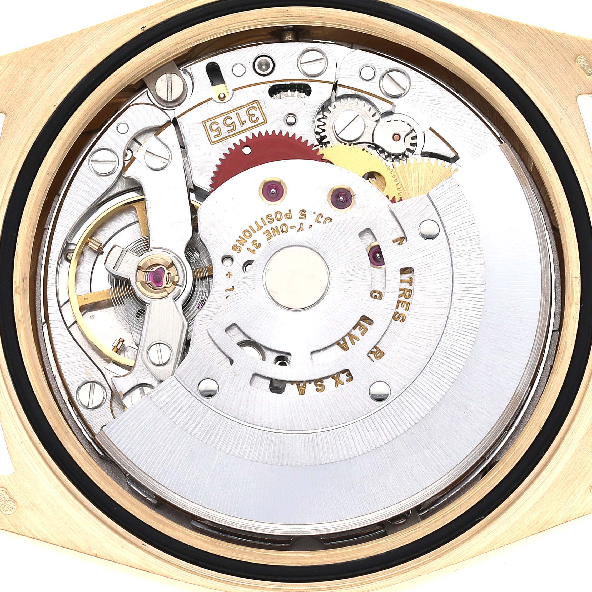 The image shows the internal mechanism of a Rolex President 18238LR Men's Yellow Gold Champagne Dial 18238LR Men's Yellow Gold Champagne Dial model watch from the back, revealing gears and the movement components.