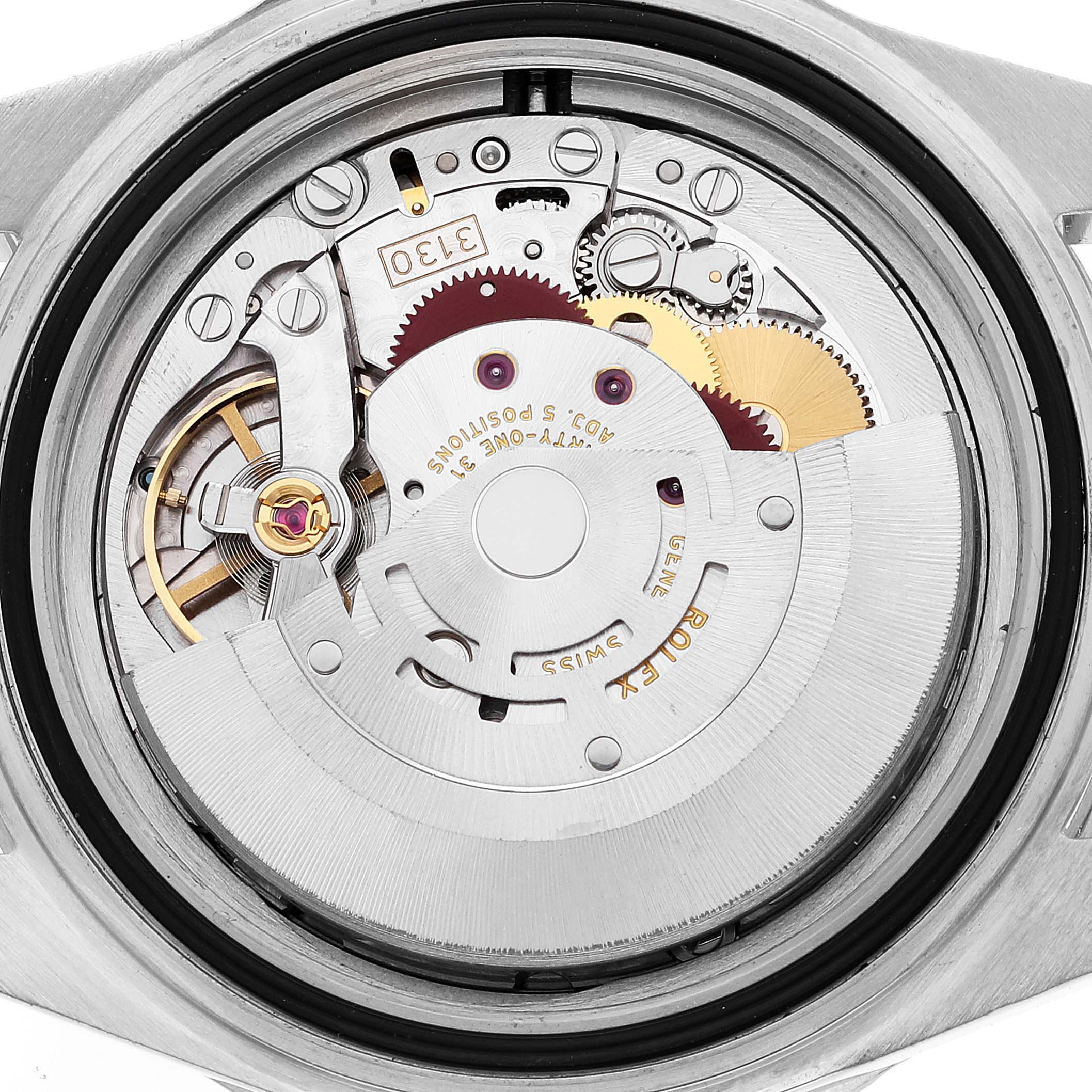 The image shows a close-up of the movement of the Rolex Submariner 14060M Men
s Stainless Steel Black Dial 14060M Men
s Stainless Steel Black Dial watch.