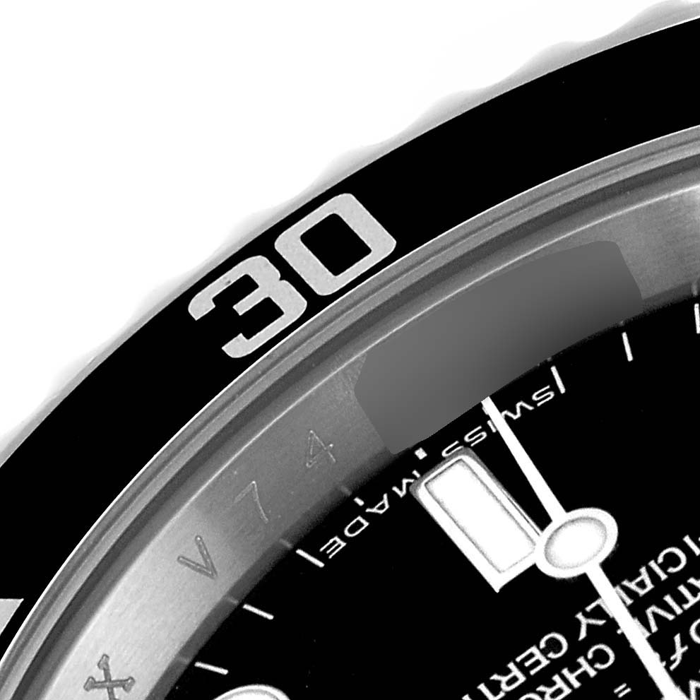 The image shows a close-up of the bezel and part of the dial of a Rolex Submariner 14060M Men
s Stainless Steel Black Dial 14060M Men
s Stainless Steel Black Dial watch, highlighting the "30" mark.