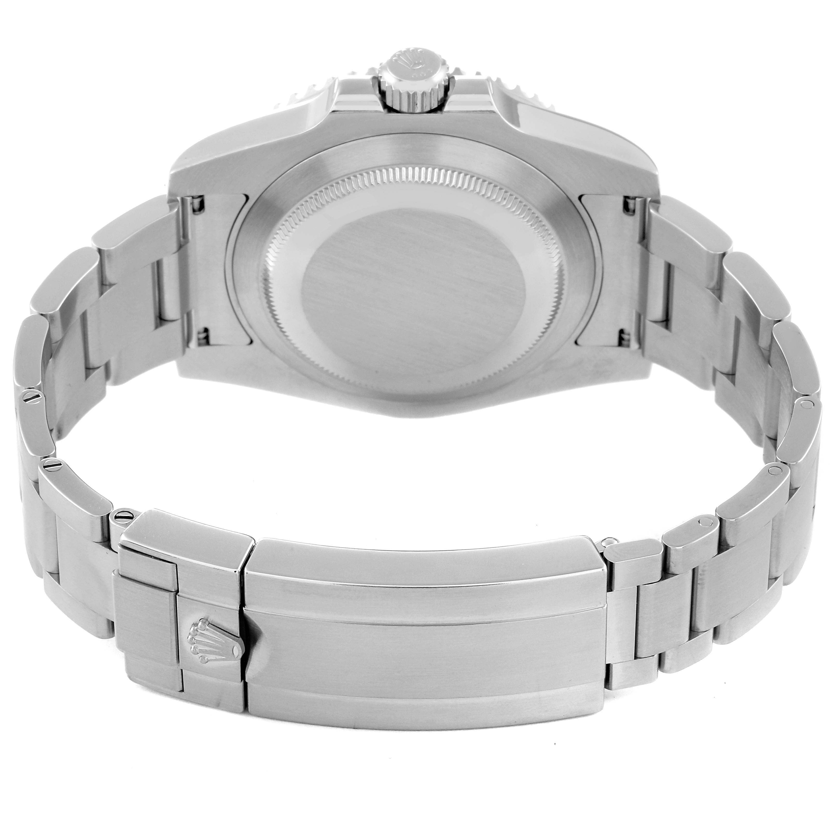 The image shows the back side of a Rolex Submariner 116610 Men's Stainless Steel Black Dial 116610 Men's Stainless Steel Black Dial watch, highlighting its case back and metal bracelet with a clasp.