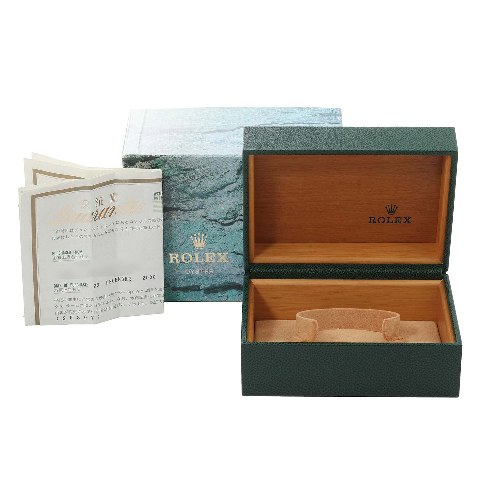 The image shows an open box for a Rolex Submariner 16610 Men
s Stainless Steel Black Dial 16610 Men
s Stainless Steel Black Dial watch, along with its certificate and outer packaging.