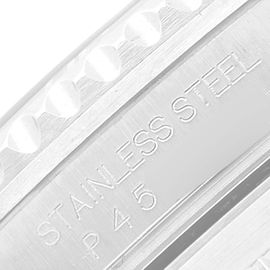 This close-up image shows the stainless steel bezel and part of the caseback of a Rolex Submariner 16610 Men
s Stainless Steel Black Dial 16610 Men
s Stainless Steel Black Dial watch.