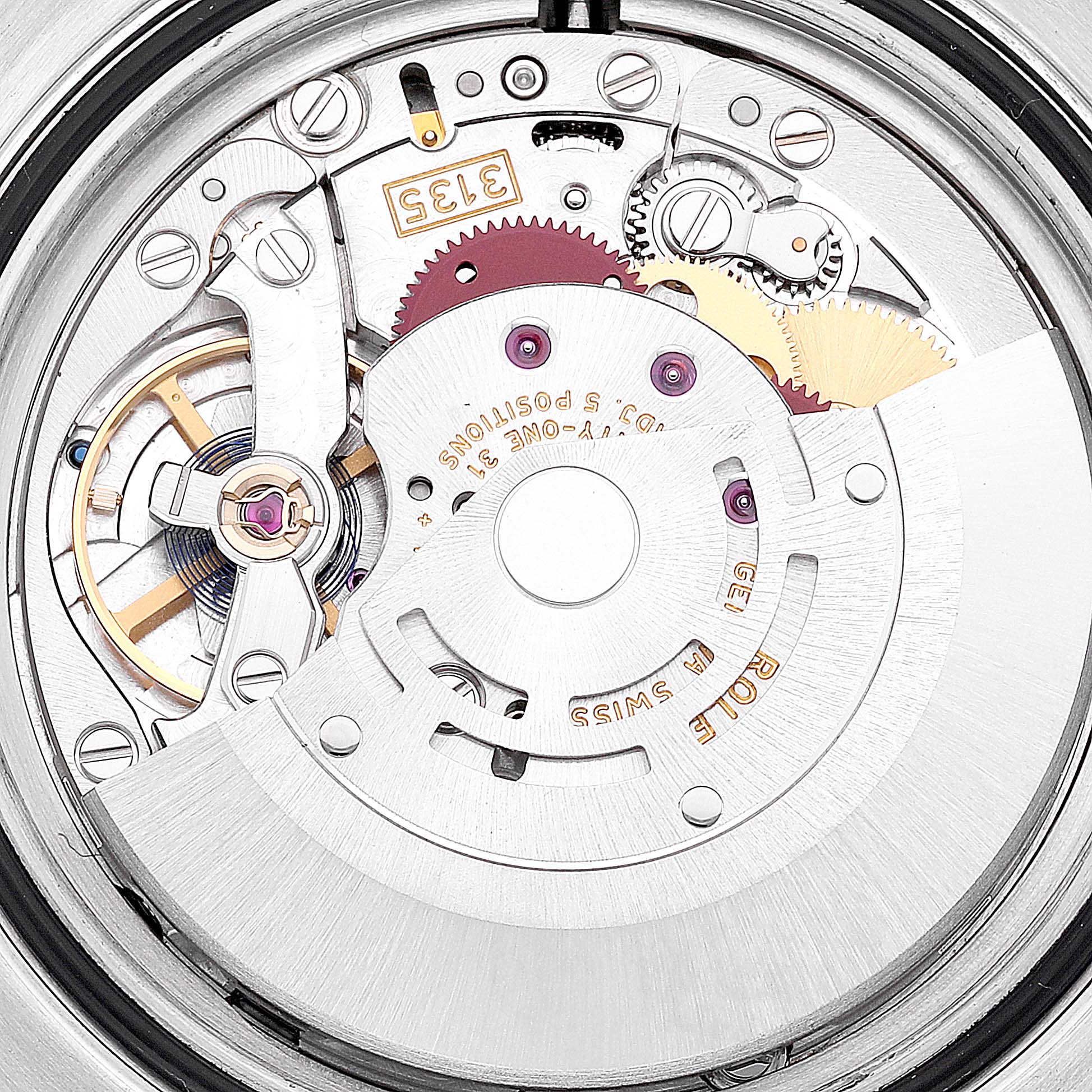 The image shows the internal mechanism of a Rolex Submariner 116610LV Men
s Stainless Steel Green Dial 116610LV Men
s Stainless Steel Green Dial, focusing on the movement and gears from a close-up angle.