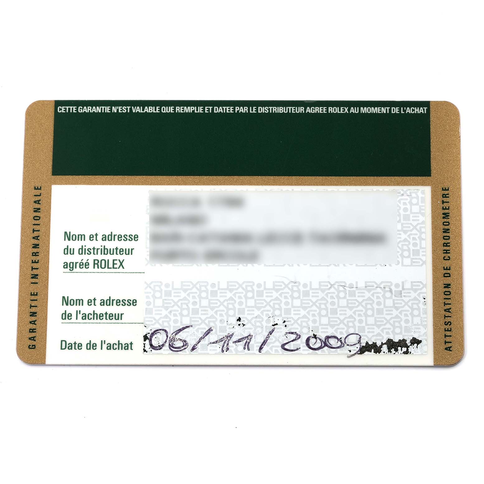 This image shows the warranty card for the Rolex Submariner 14060M Men's Stainless Steel Black Dial 14060M Men's Stainless Steel Black Dial watch, displaying purchase date and dealer information.