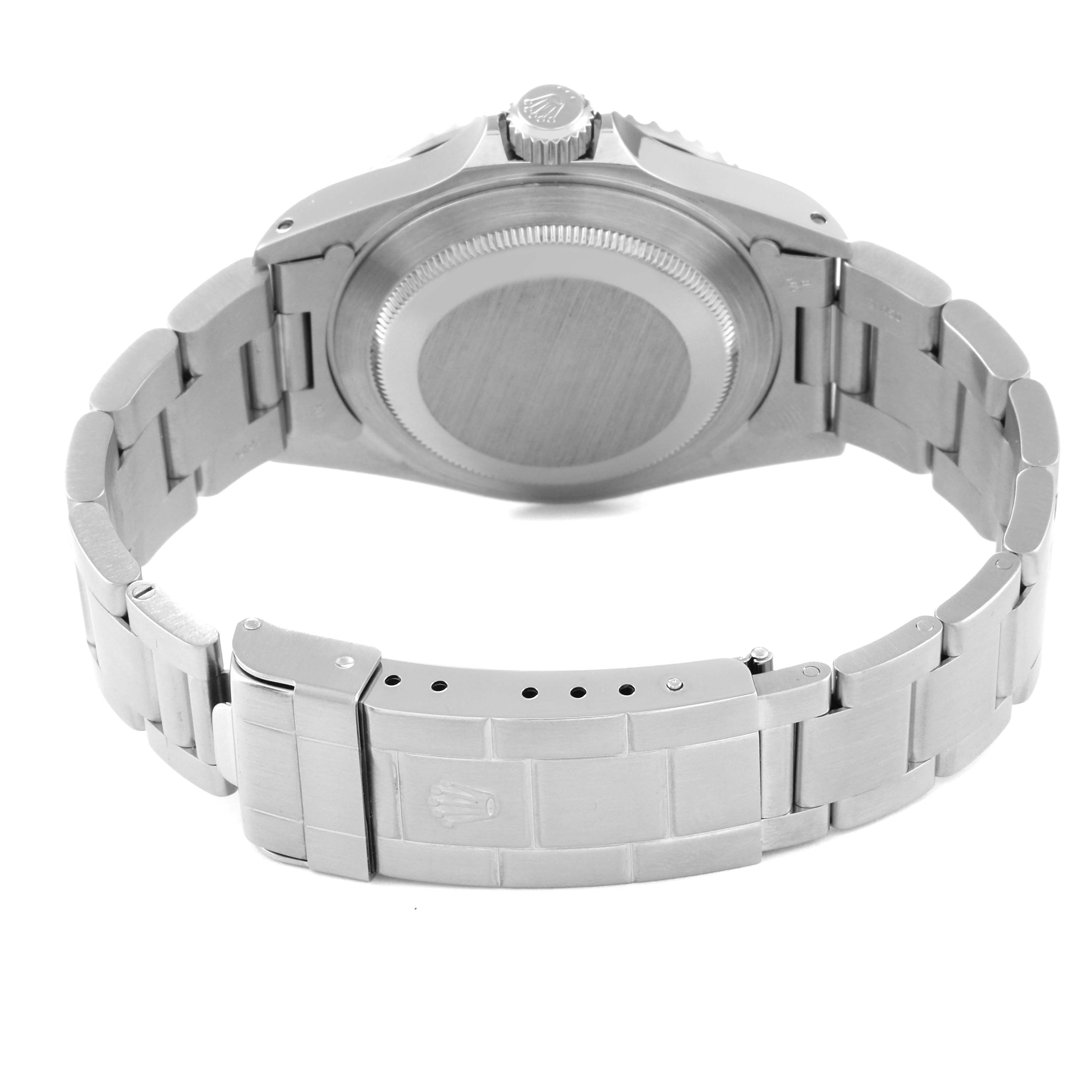 The image shows the back case and bracelet of a Rolex Submariner 14060M Men
s Stainless Steel Black Dial 14060M Men
s Stainless Steel Black Dial watch from a rear angle.