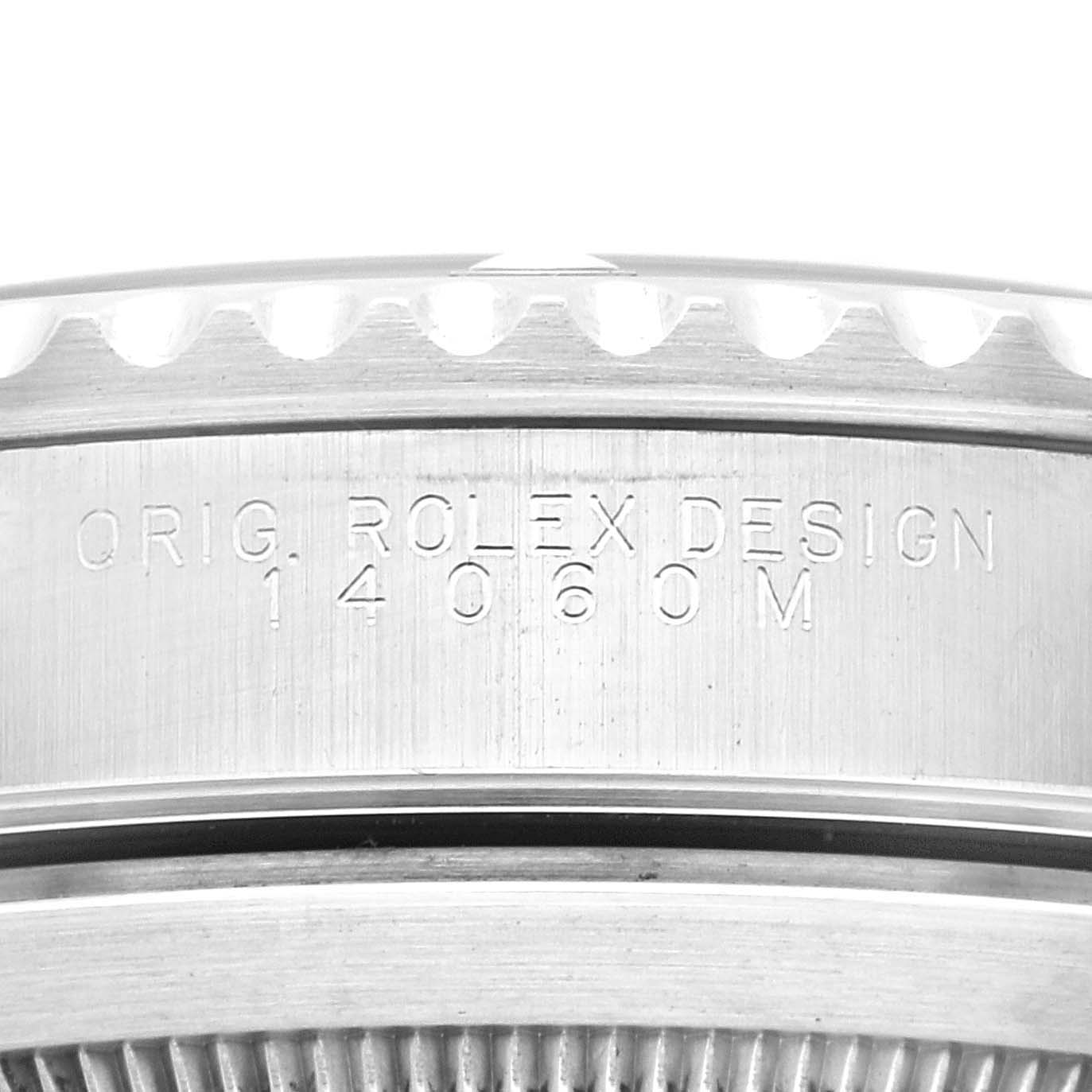 This image shows a close-up of the side engraving on a Rolex Submariner 14060M Men's Stainless Steel Black Dial 14060M Men's Stainless Steel Black Dial watch case, displaying the model number 14060M.