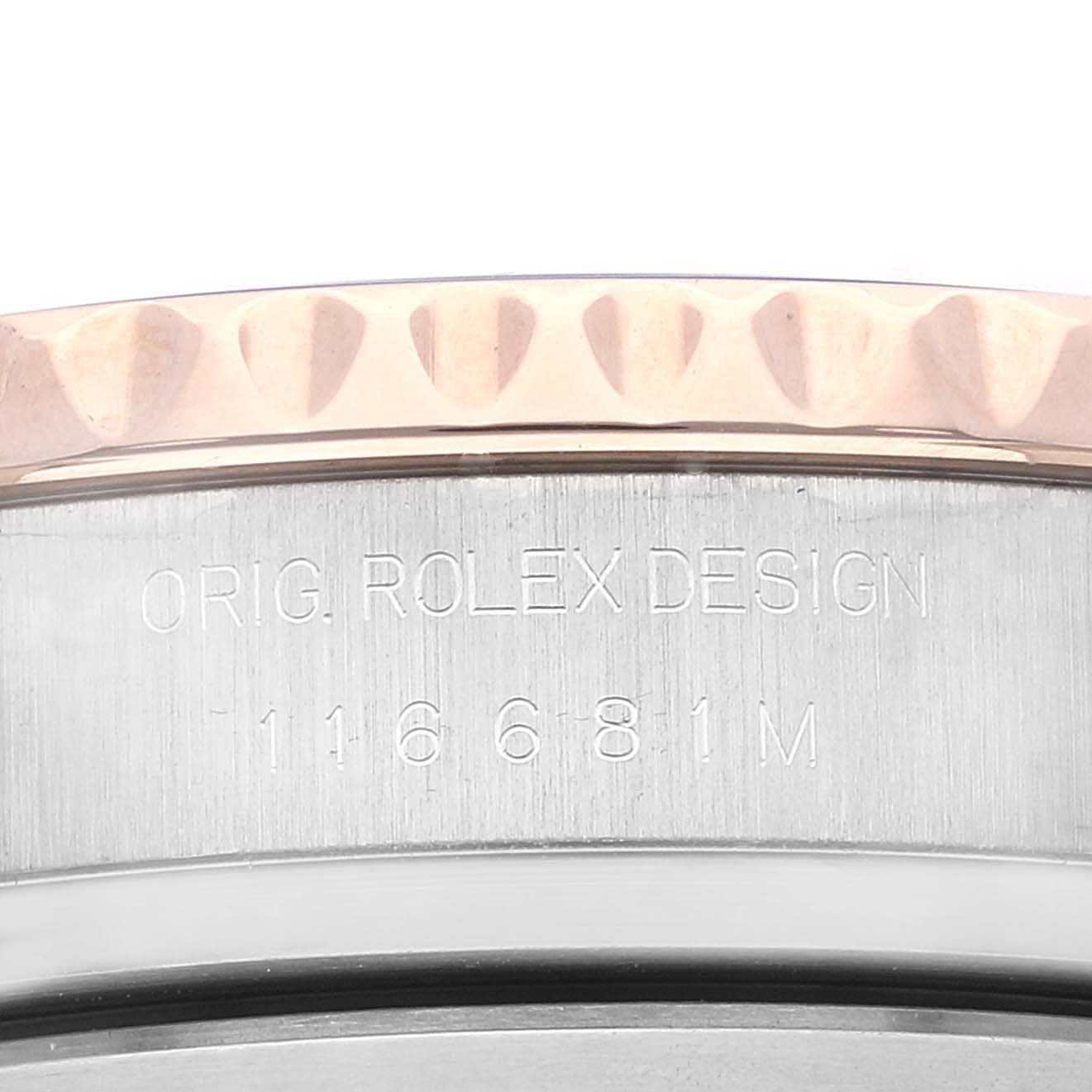 This image shows the side view of the casing of a Rolex Yacht-Master 116681 Men
s Steel and Gold (two tone) White Dial 116681 Men
s Steel and Gold (two tone) White Dial, displaying the model number and design inscription.