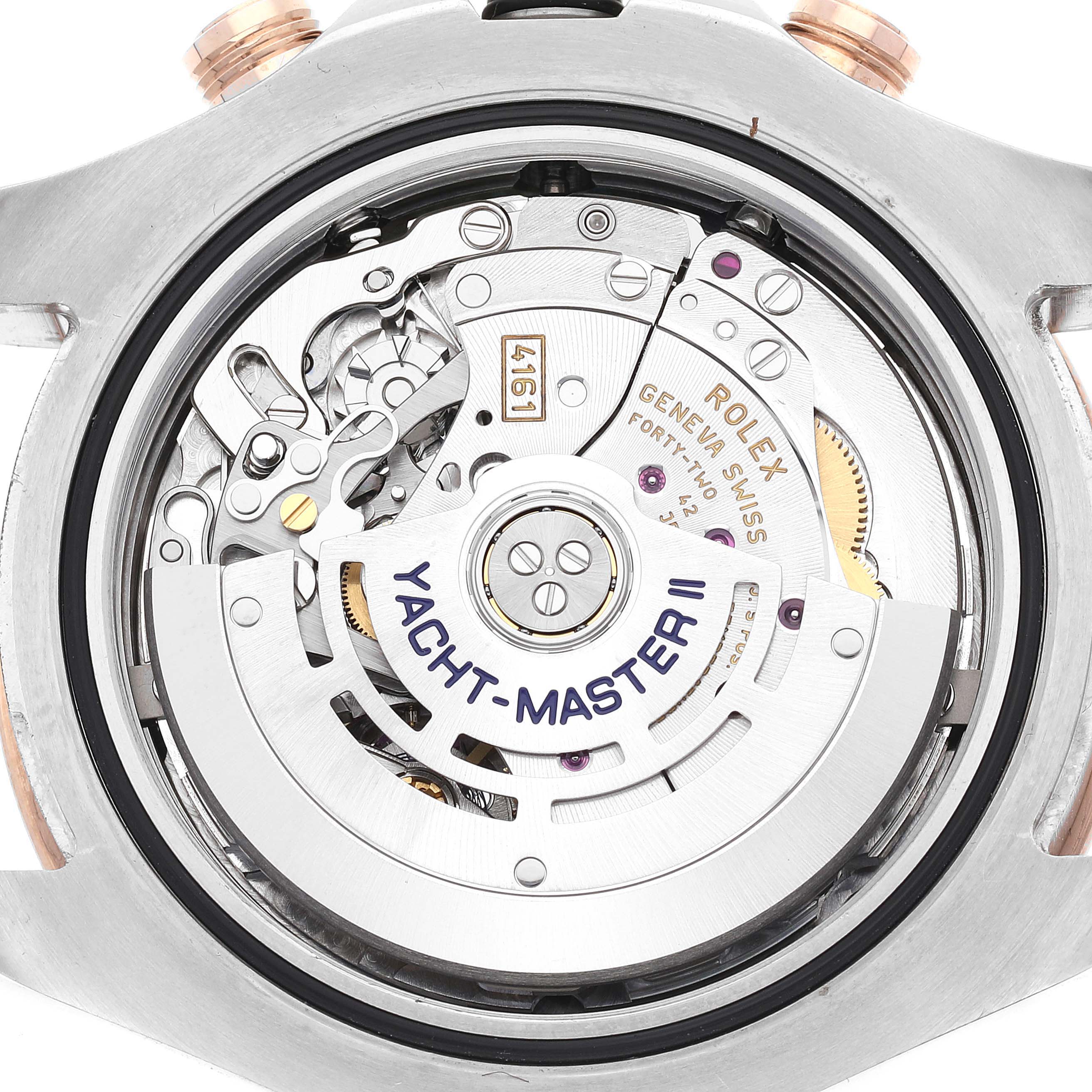 This image shows the back view of the Rolex Yacht-Master 116681 Men
s Steel and Gold (two tone) White Dial 116681 Men
s Steel and Gold (two tone) White Dial II watch, focusing on its exposed movement and mechanical components.