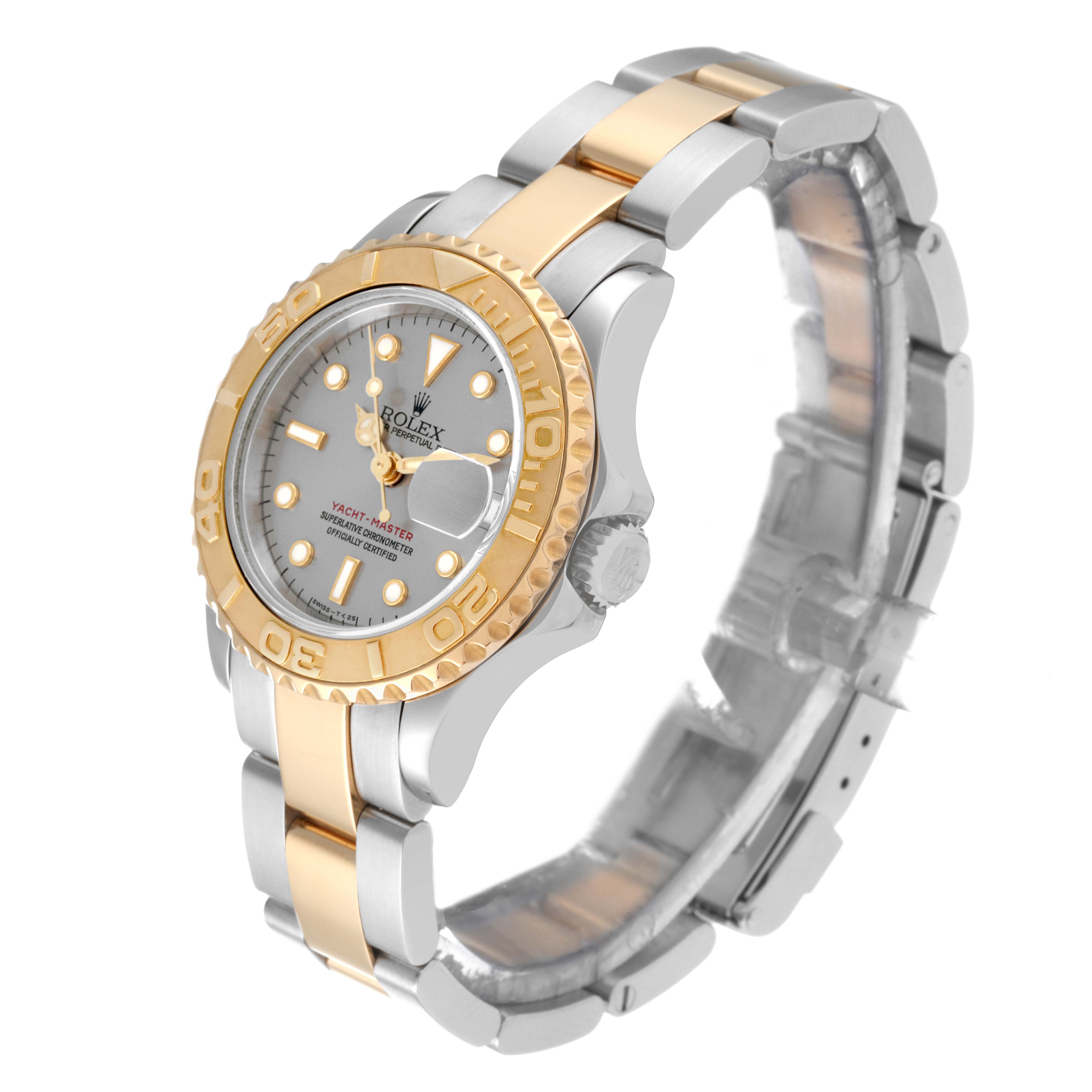 The image shows a Rolex Yacht-Master 69623 Women
s Steel and Gold (two tone) Grey Dial 69623 Women
s Steel and Gold (two tone) Grey Dial watch at an angle displaying the dial, bezel, crown, and bracelet.