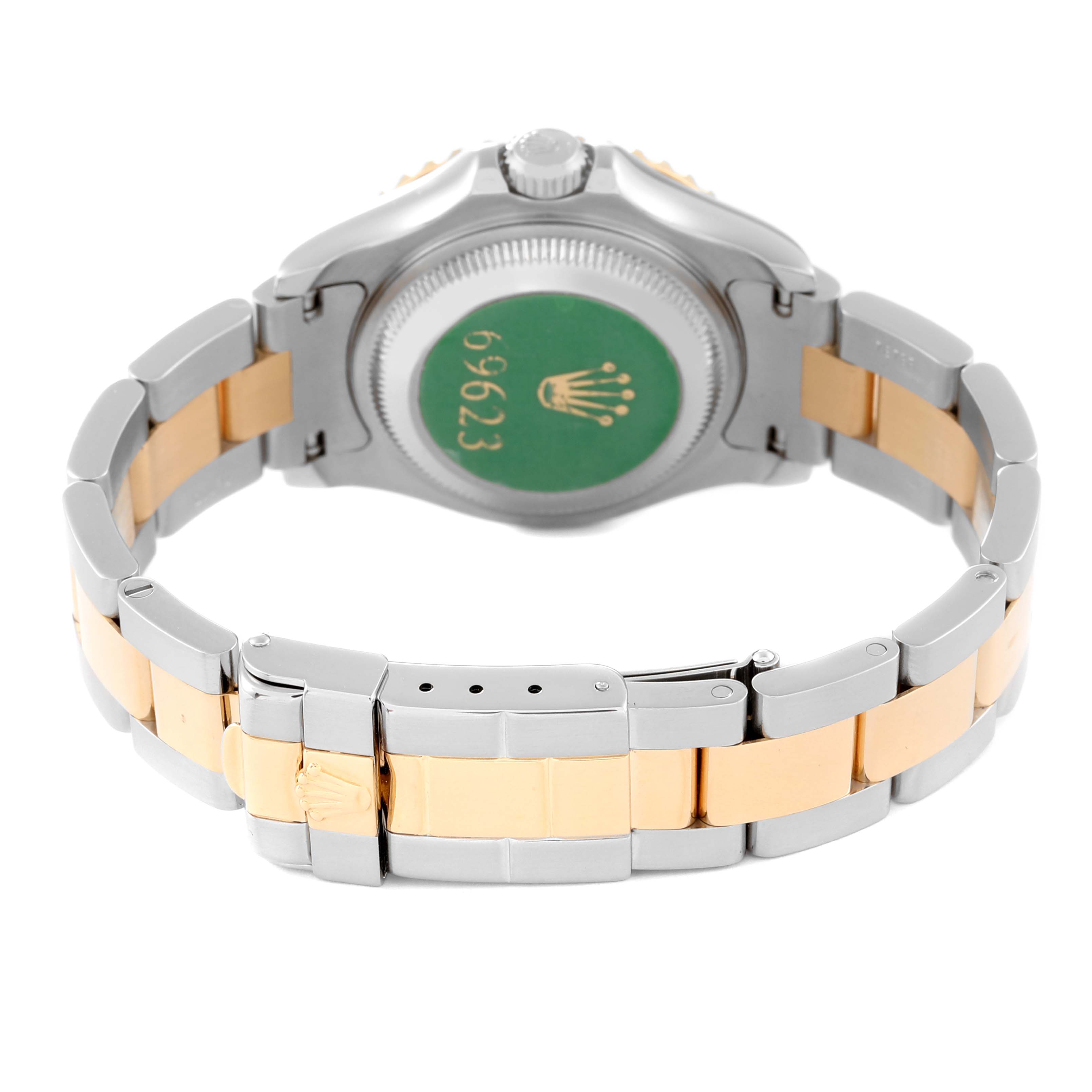 The image shows the back case and clasp of a Rolex Yacht-Master 69623 Women
s Steel and Gold (two tone) Grey Dial 69623 Women
s Steel and Gold (two tone) Grey Dial watch, with a two-tone metal bracelet.