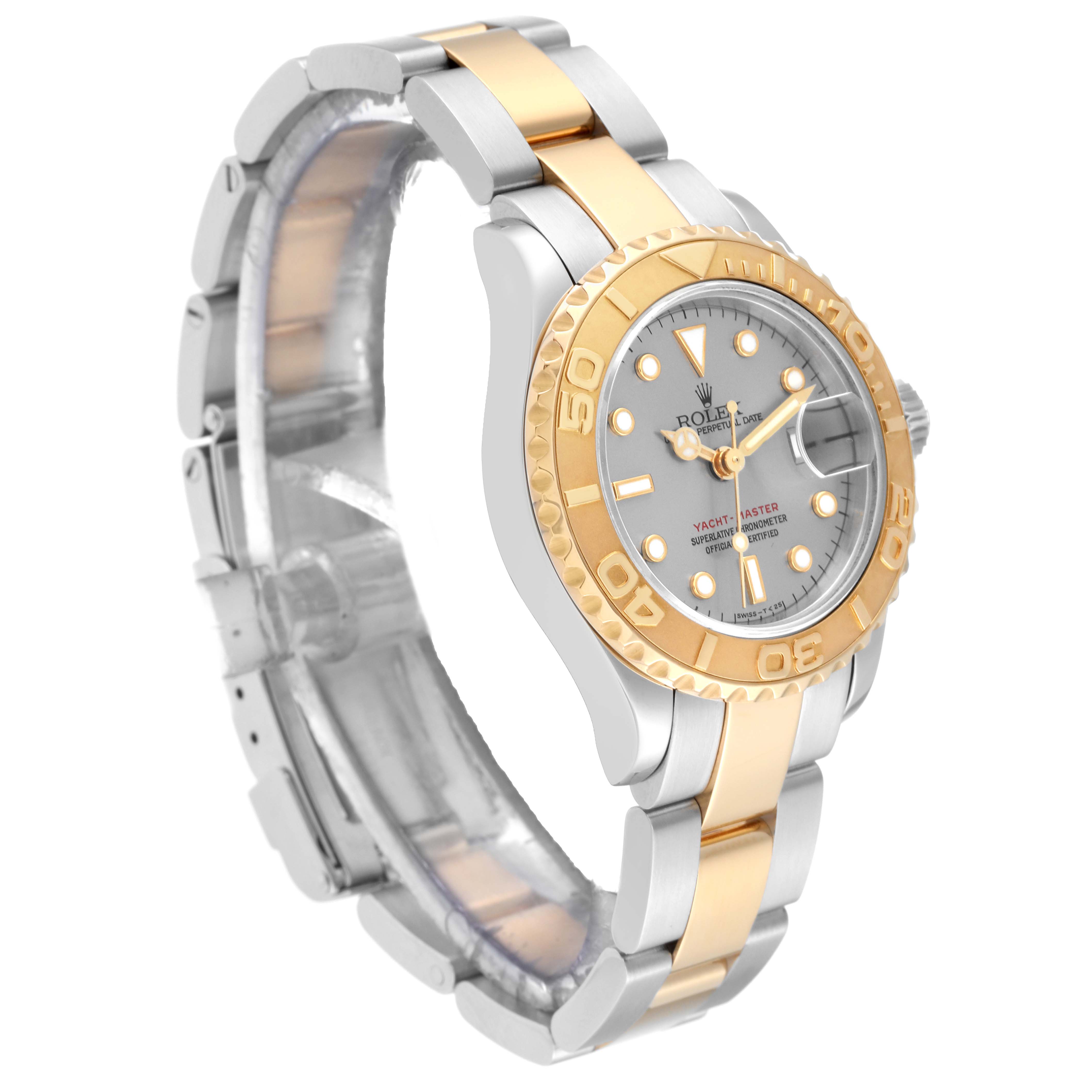 This Rolex Yacht-Master 69623 Women
s Steel and Gold (two tone) Grey Dial 69623 Women
s Steel and Gold (two tone) Grey Dial watch is shown at an angle, highlighting its two-tone bracelet, bezel, and dial.