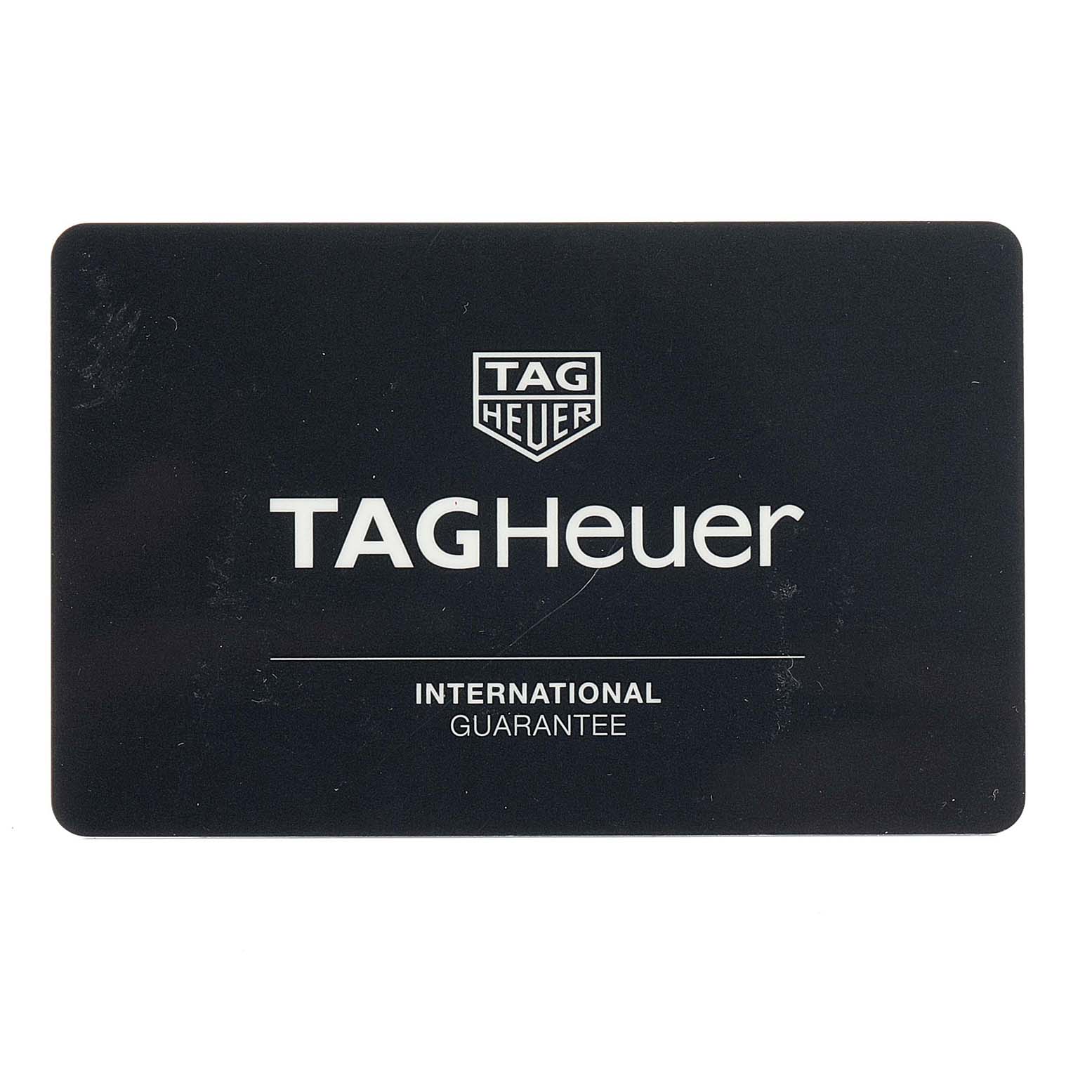 The image shows a TAG Heuer international guarantee card for the Aquaracer model.