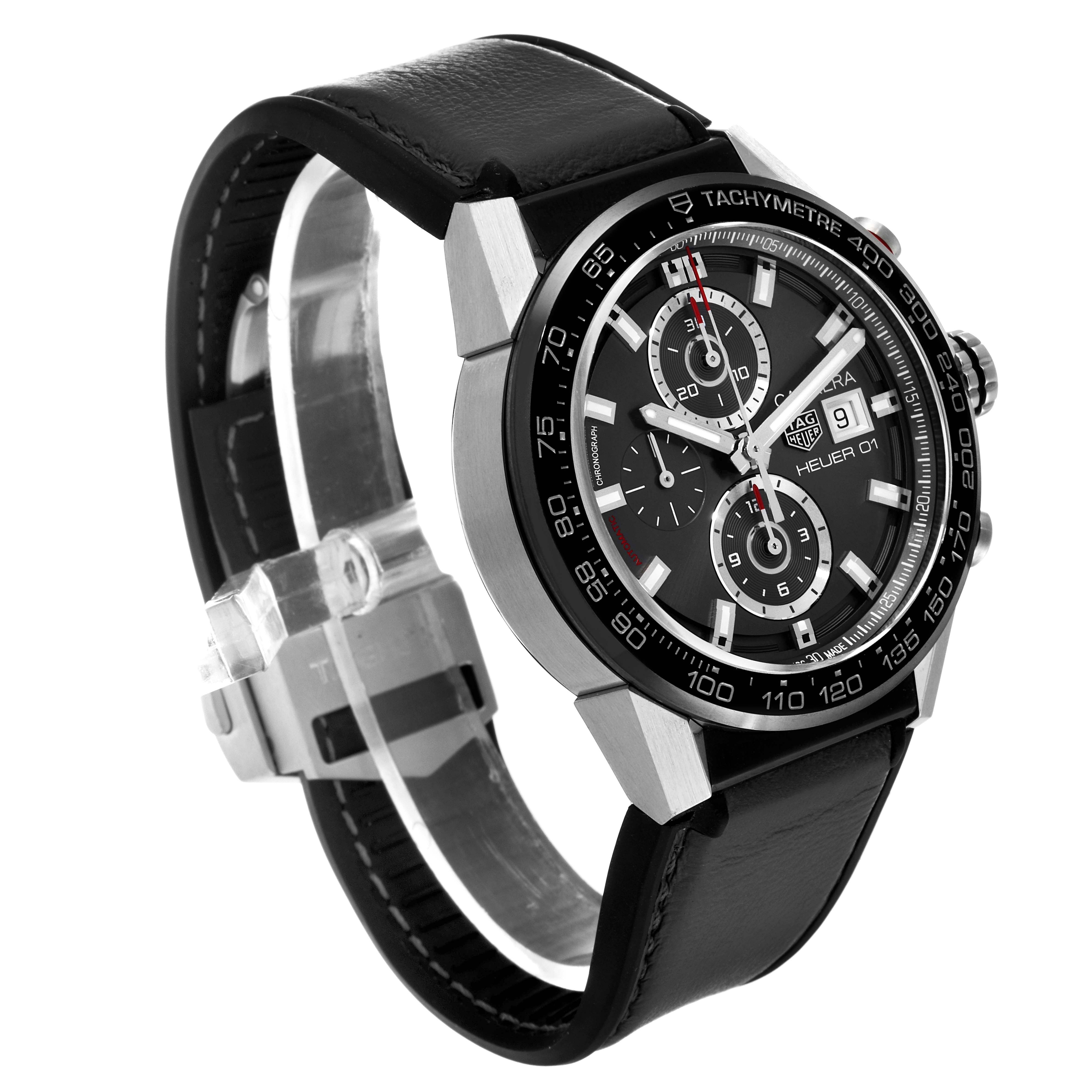 The image shows a Tag Heuer Carrera CAR201W Men's Stainless Steel Black Dial CAR201W Men's Stainless Steel Black Dial watch at an oblique angle, highlighting its face, case, and leather strap.