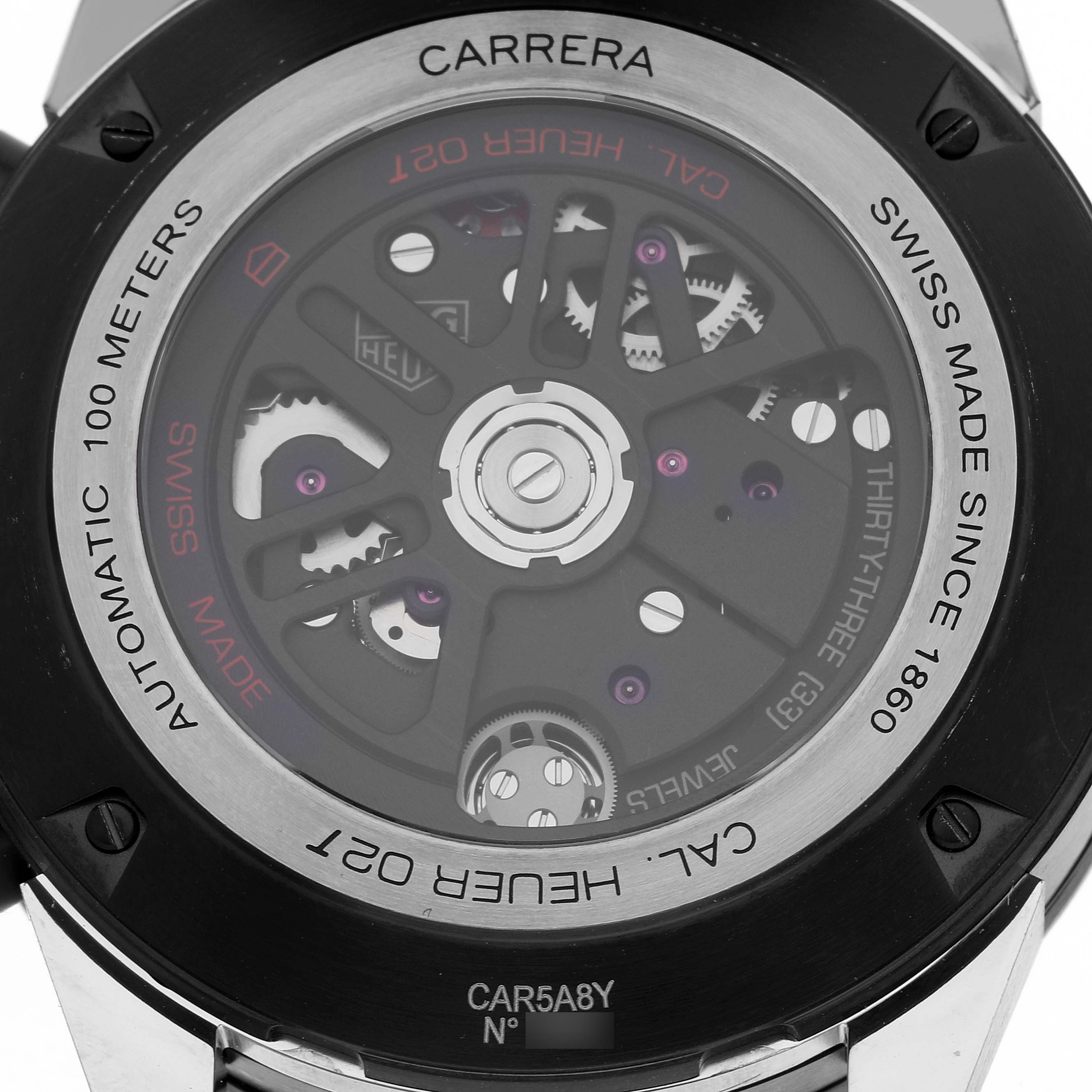 The image shows the back of the Tag Heuer Carrera CAR5A8Y.FC6377 Men's Titanium Black Dial CAR5A8Y.FC6377 Men's Titanium Black Dial watch, highlighting its automatic movement and internal mechanisms.