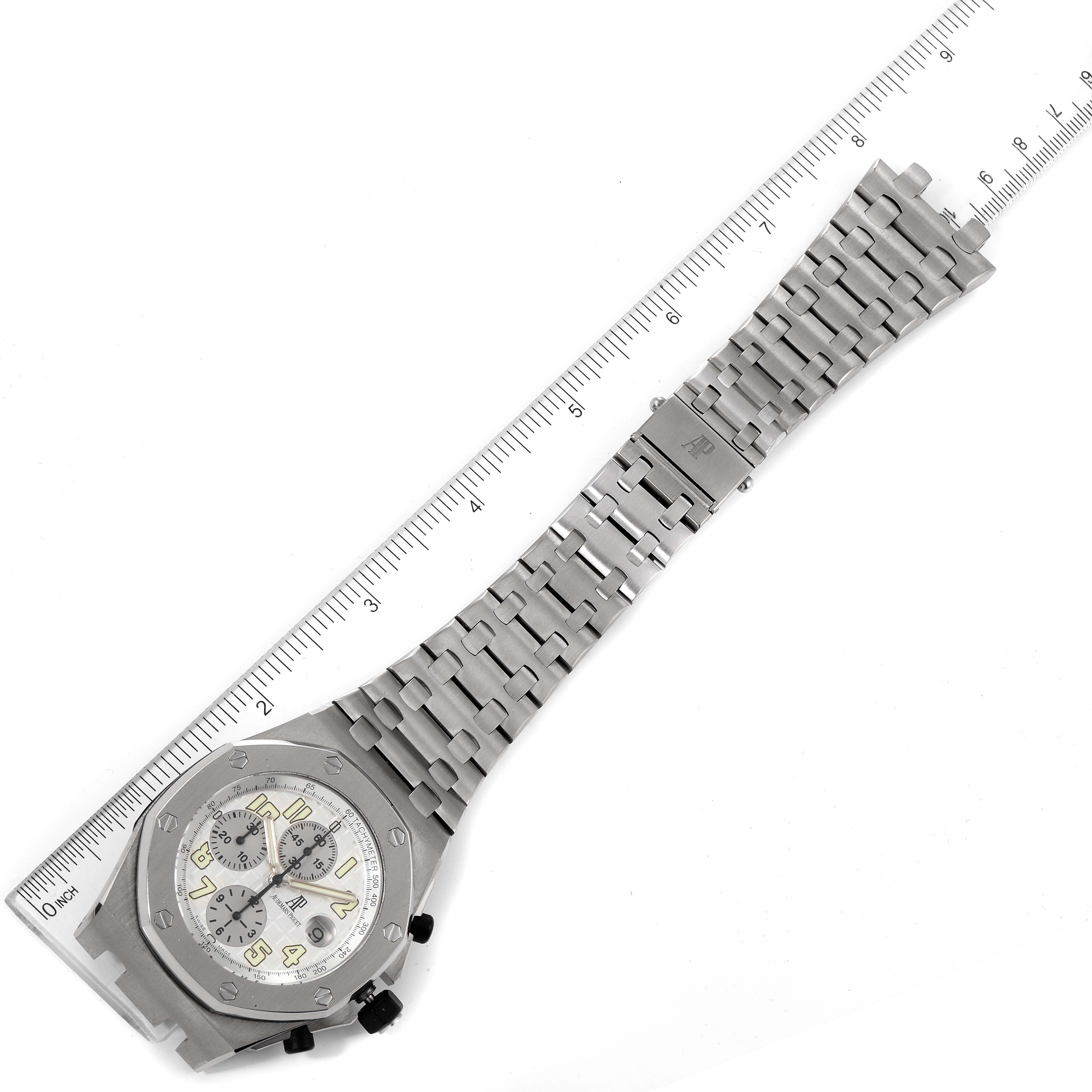 The image shows a top-down view of an Audemars Piguet Royal Oak Offshore 25721TI.OO.1000TI.05 Men's Titanium Silver Dial 25721TI.OO.1000TI.05 Men's Titanium Silver Dial watch, including its face, bezel, and full metal bracelet.