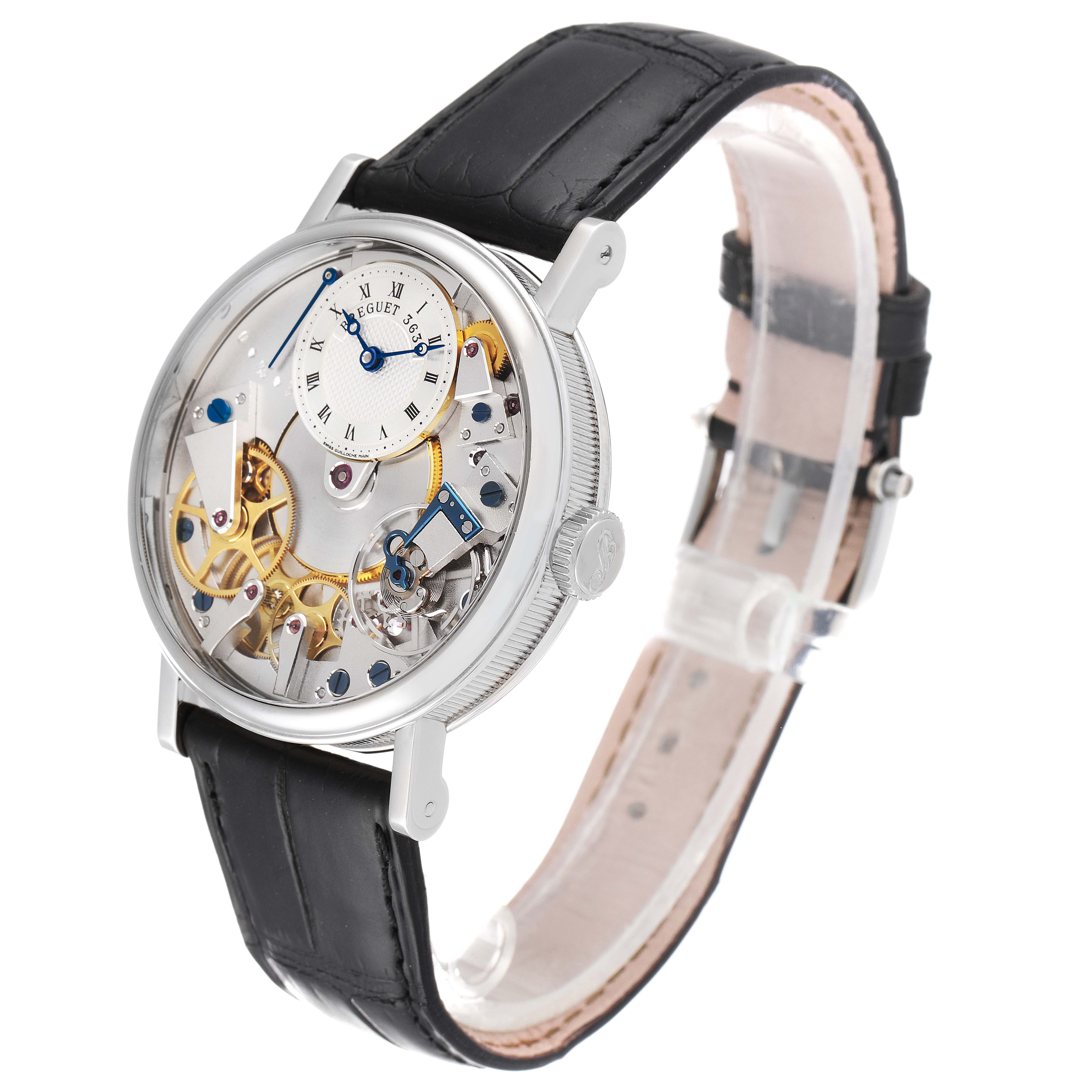 This is a Breguet Tradition 7027BB/11/9V6 Men's White Gold Transparent Dial 7027BB/11/9V6 Men's White Gold Transparent Dial model watch shown at an angled view, highlighting its intricate mechanism and the black leather strap.