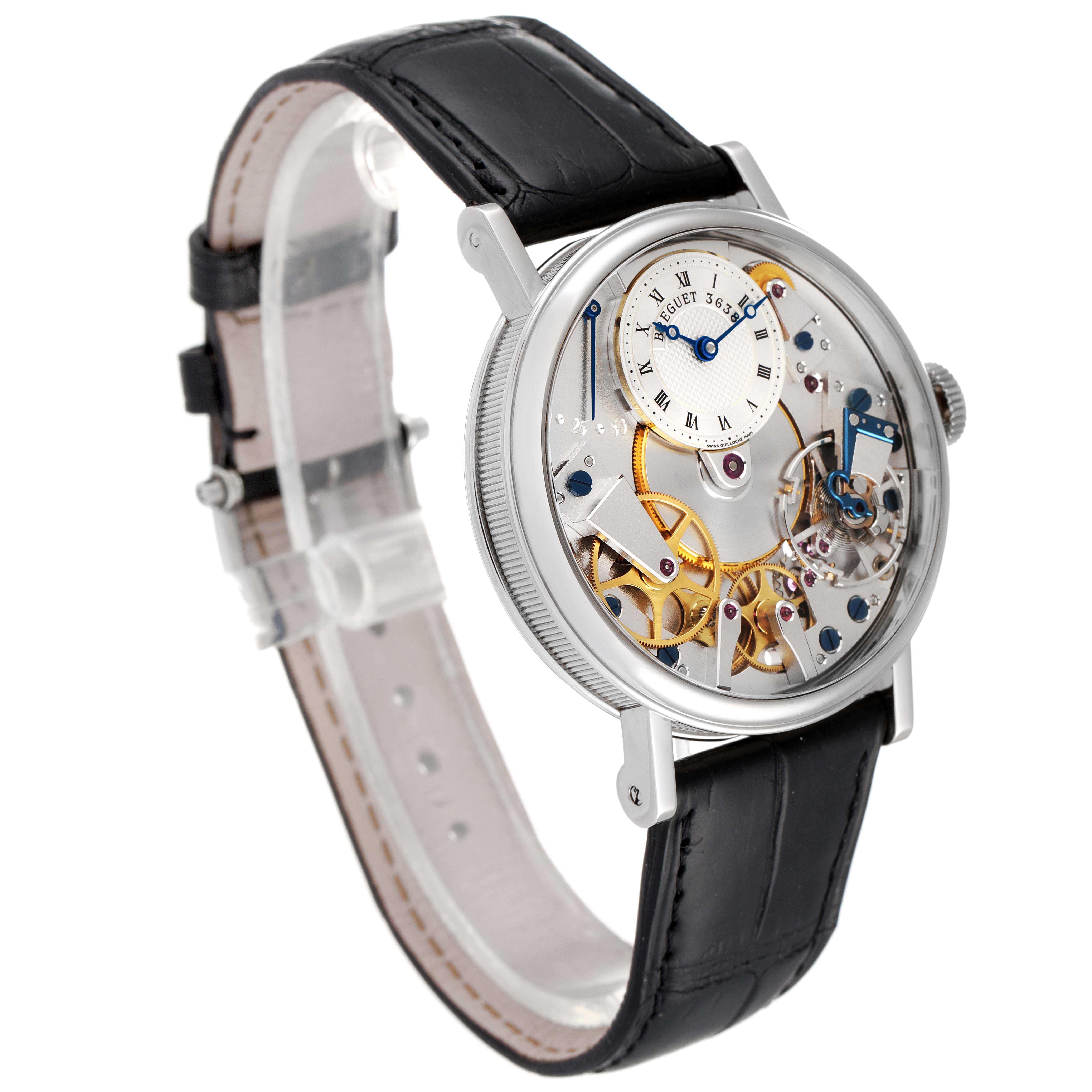 The image shows a Breguet Tradition 7027BB/11/9V6 Men's White Gold Transparent Dial 7027BB/11/9V6 Men's White Gold Transparent Dial model watch at a three-quarter angle, highlighting its dial, inner mechanics, and black leather strap.