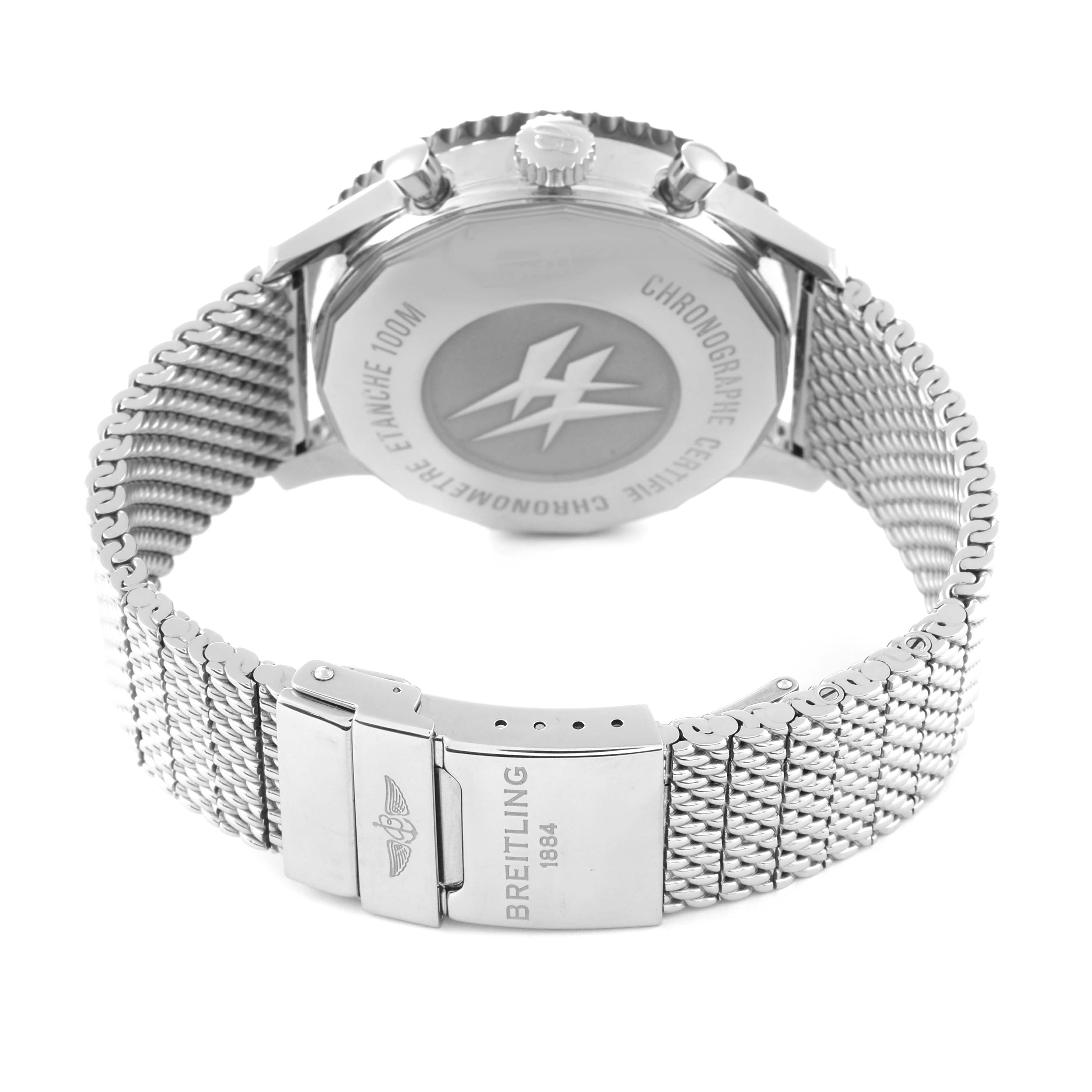 The image shows the back view of a Breitling Chronoliner Y2431012/BE10 Men's Stainless Steel Black Dial Y2431012/BE10 Men's Stainless Steel Black Dial watch, focusing on the case back and the metal mesh bracelet clasp.