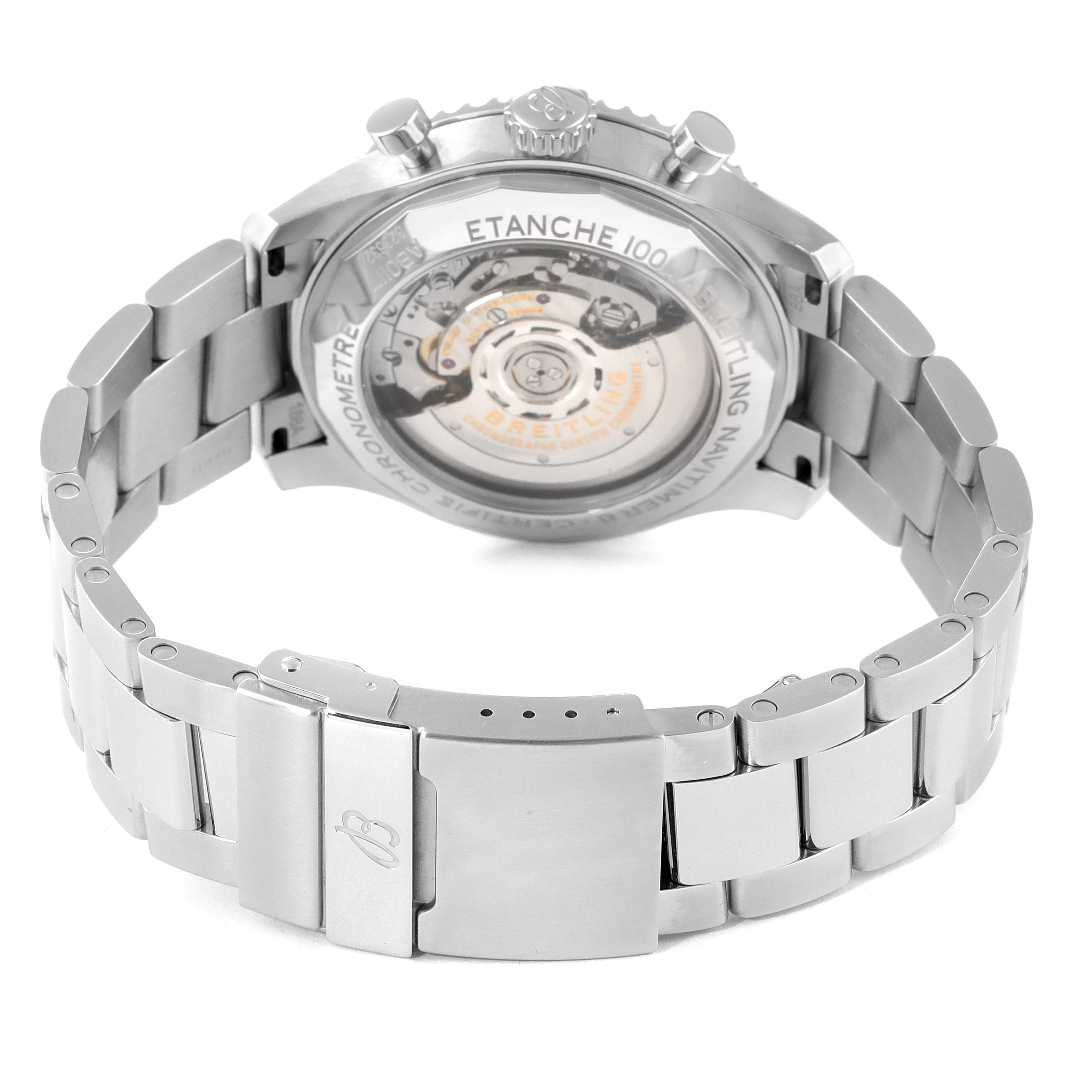 The image shows the back and bracelet of the Breitling Navitimer watch, highlighting its transparent case back and metal clasp.