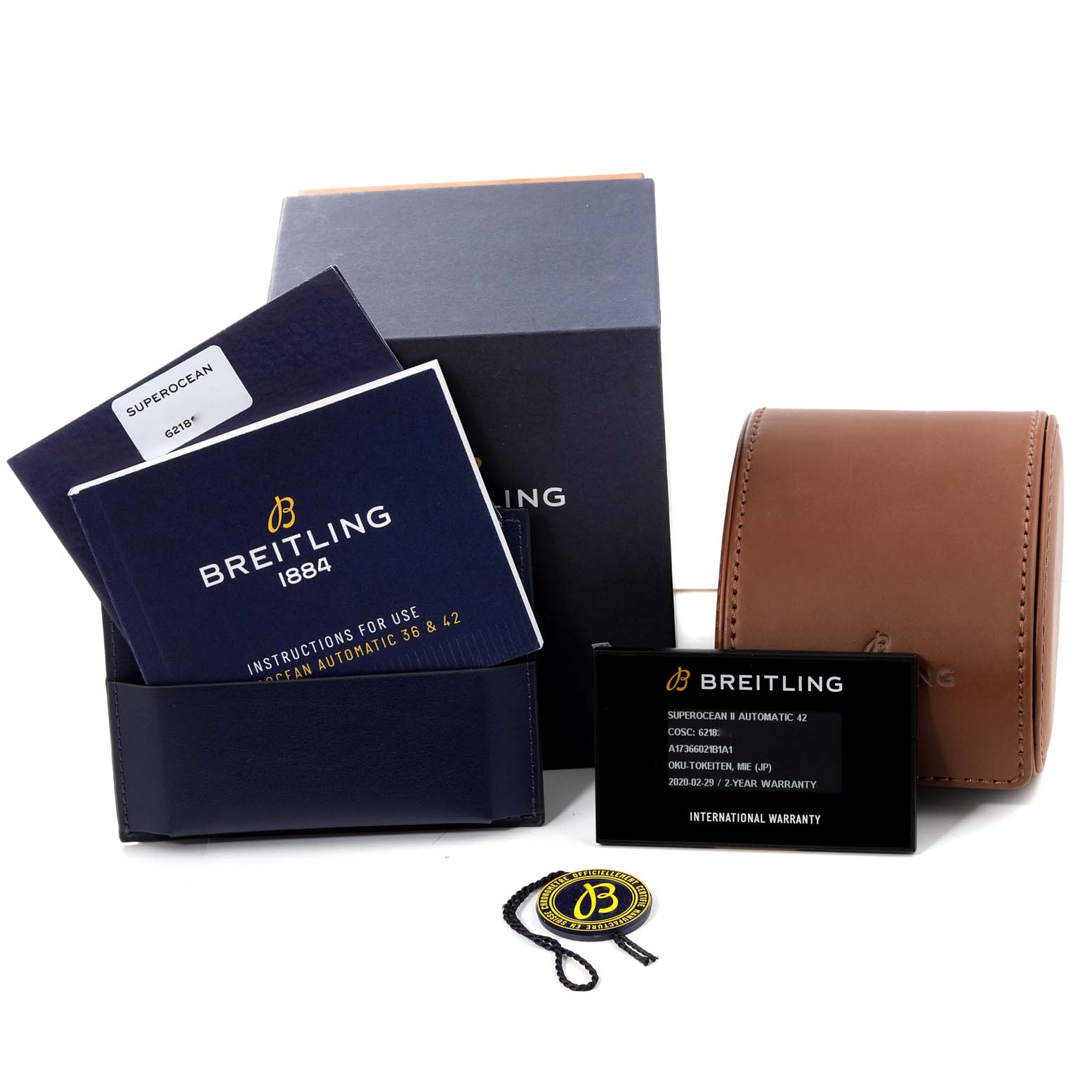 The image shows the packaging, instruction manuals, warranty card, tag, and a leather carrying case for the Breitling Superocean A17366 Men's Stainless Steel Black Dial A17366 Men's Stainless Steel Black Dial watch.