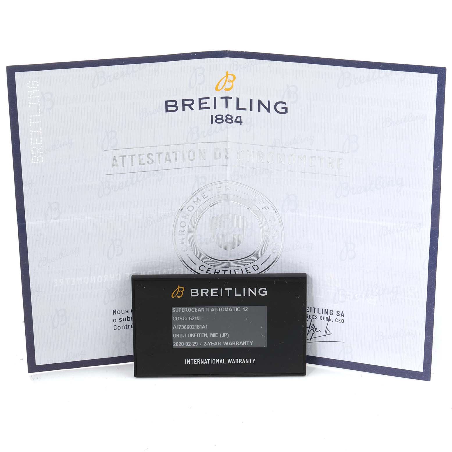 The image shows the warranty card and certification papers for the Breitling Superocean A17366 Men's Stainless Steel Black Dial A17366 Men's Stainless Steel Black Dial watch.