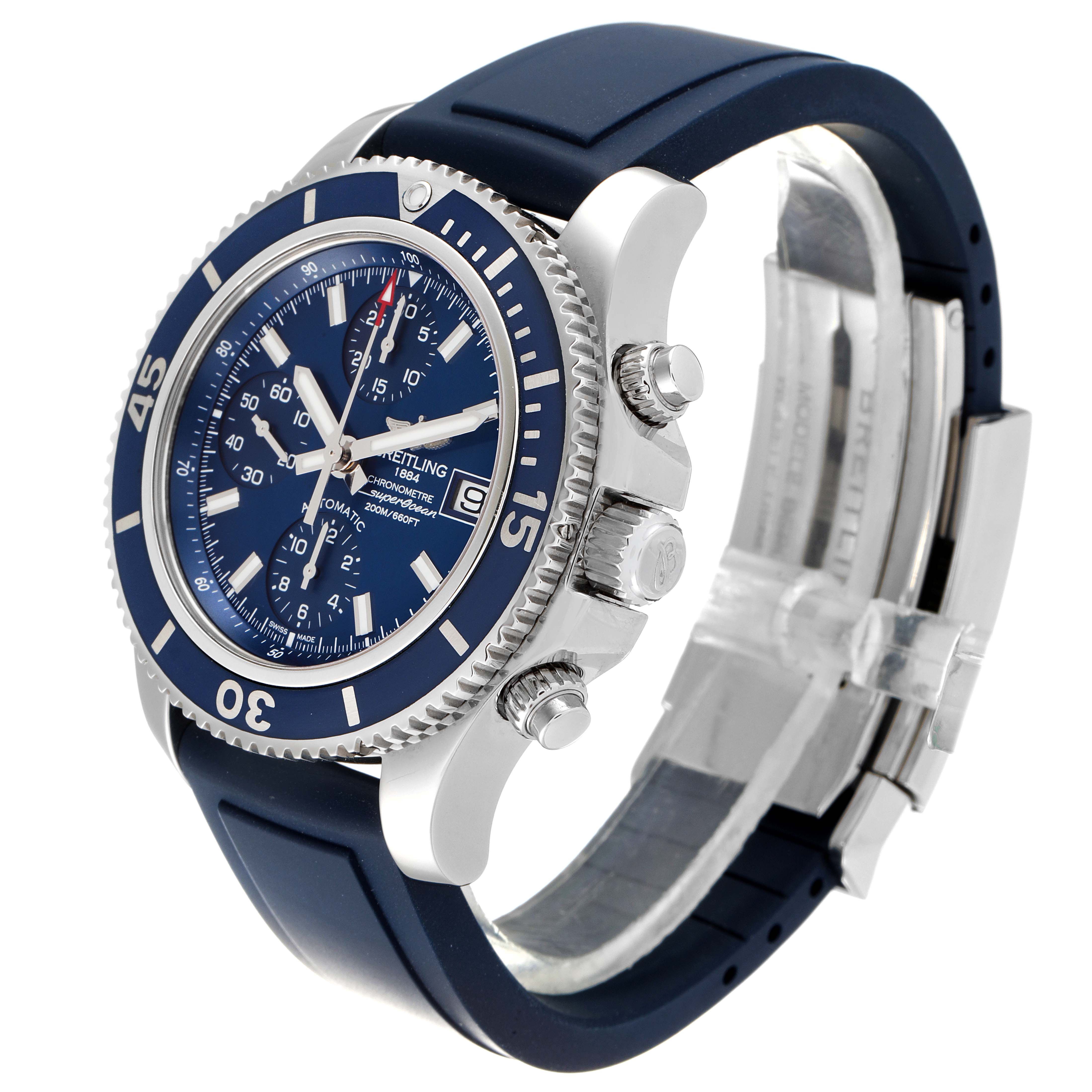 The image shows a side and partial front view of a Breitling Superocean A13311 Men's Stainless Steel Blue Dial A13311 Men's Stainless Steel Blue Dial watch featuring a blue dial and band with a steel case and crown.