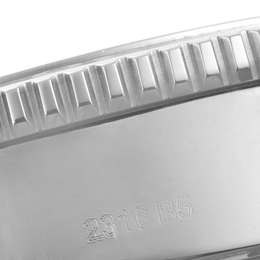 This image shows a close-up of the side and bezel of the Breitling Superocean A13311 Men's Stainless Steel Blue Dial A13311 Men's Stainless Steel Blue Dial watch, with visible serial numbers.