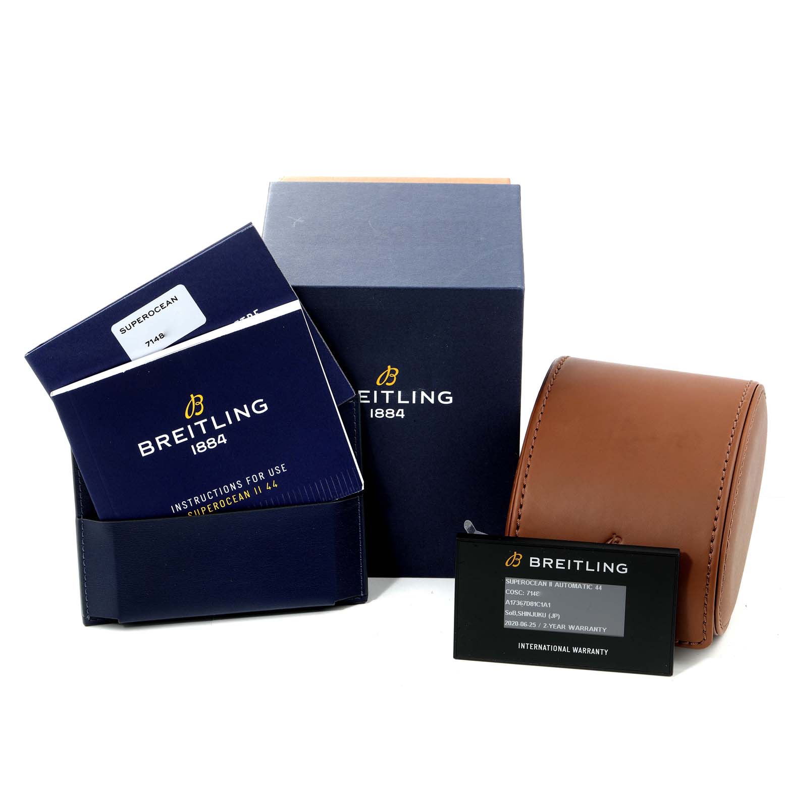 The image shows packaging and accessories for a Breitling Superocean A17367 Men's Stainless Steel Blue Dial A17367 Men's Stainless Steel Blue Dial watch, including a box, a warranty card, and instructions.