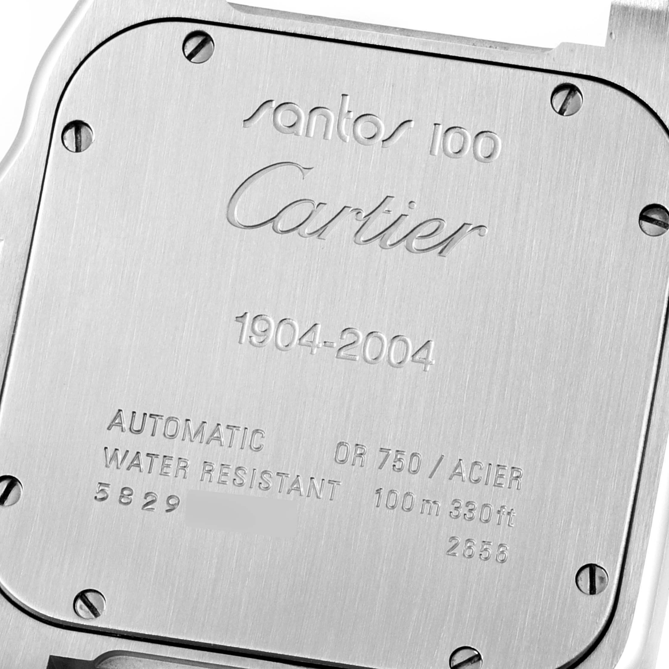 This image shows the stainless steel case back of a Santos 100 model by Cartier.