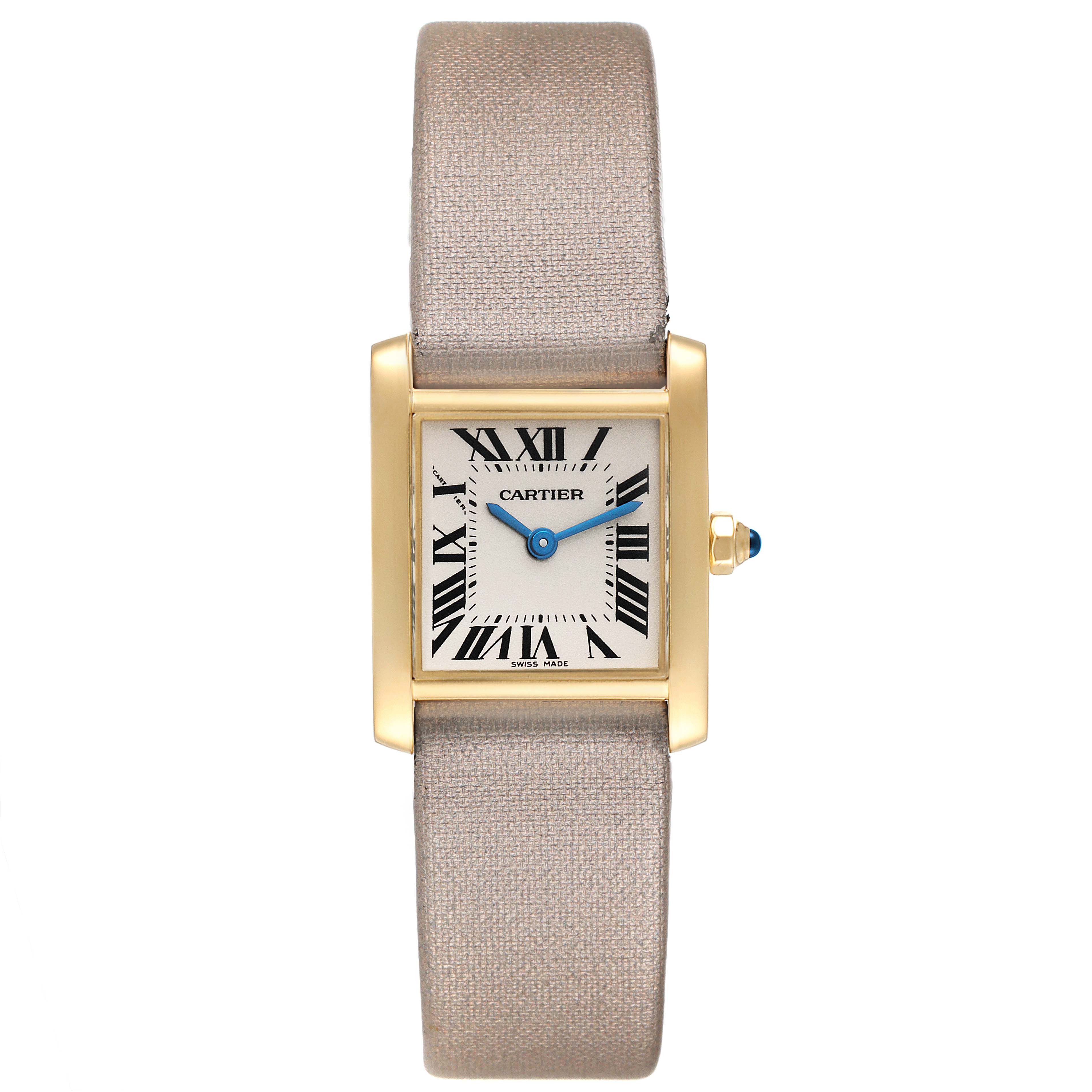 The Tank Française watch by Cartier is shown from a top-down angle, displaying its face, strap, and sides.