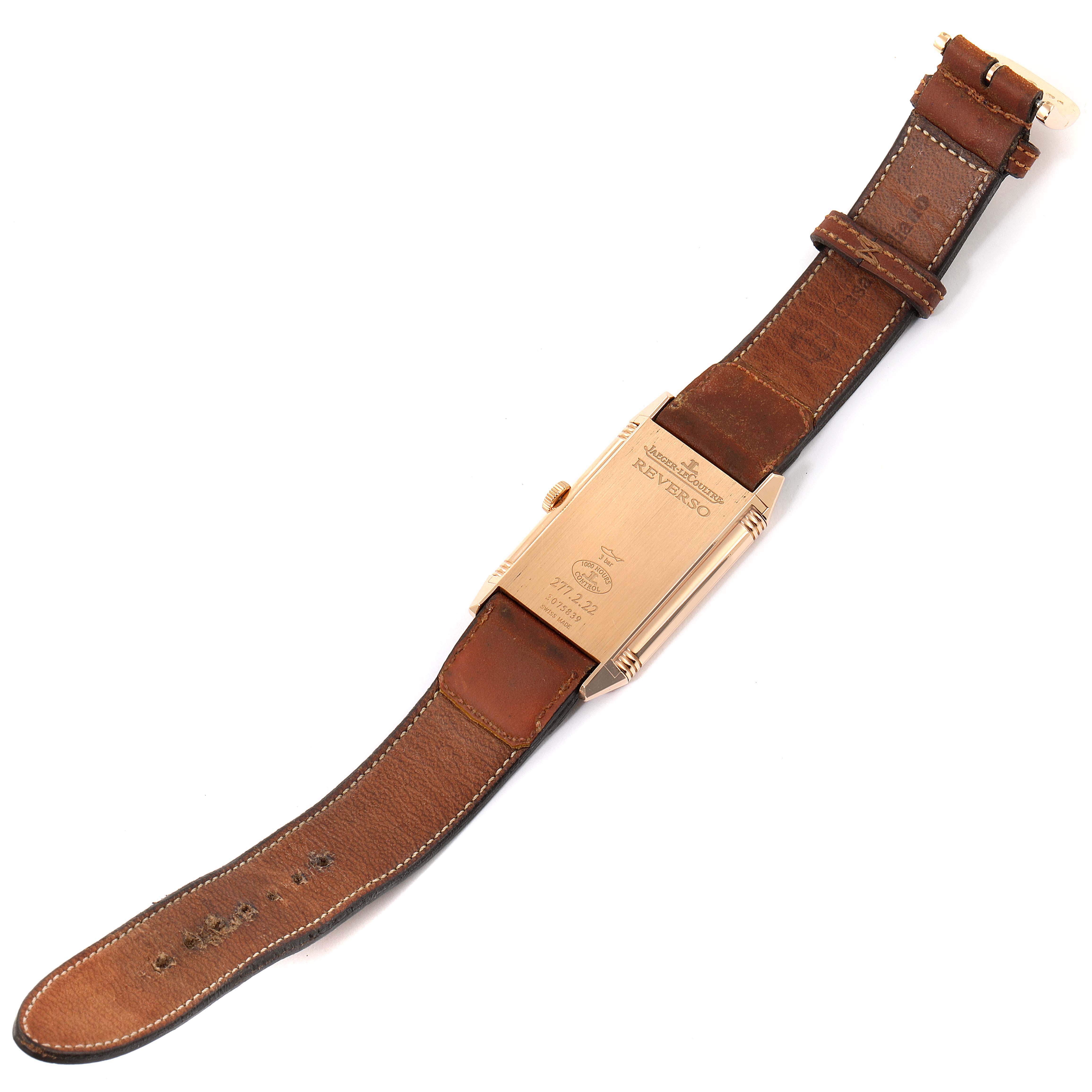 The image shows the back and leather strap of a Jaeger LeCoultre Reverso Q2782560 Men's Rose Gold Brown Dial Q2782560 Men's Rose Gold Brown Dial watch, laid flat and viewed from above.