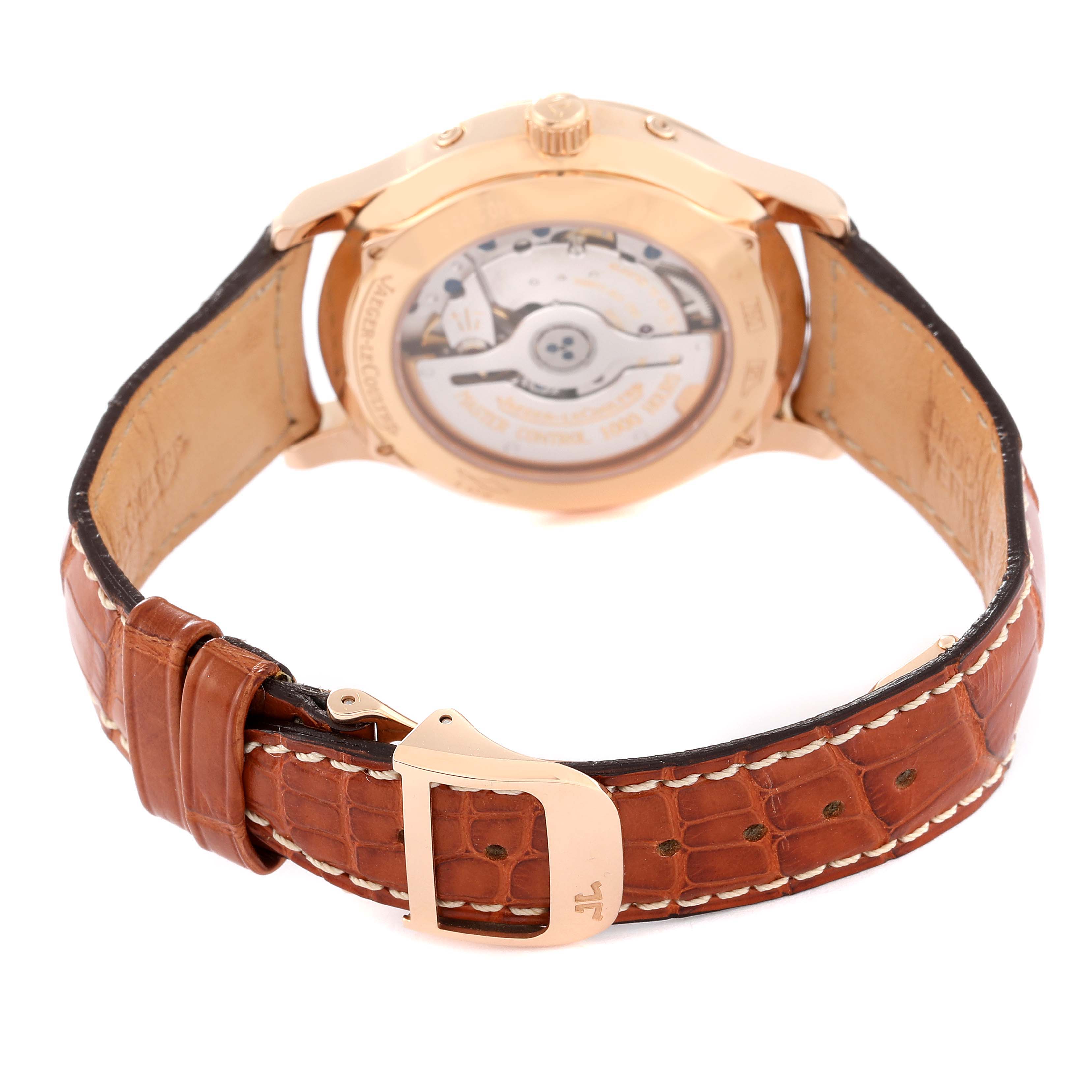 The image shows the back view of a Jaeger LeCoultre Master 140.240.987B Men's Rose Gold Black Dial 140.240.987B Men's Rose Gold Black Dial model watch, highlighting the movement and brown leather strap.