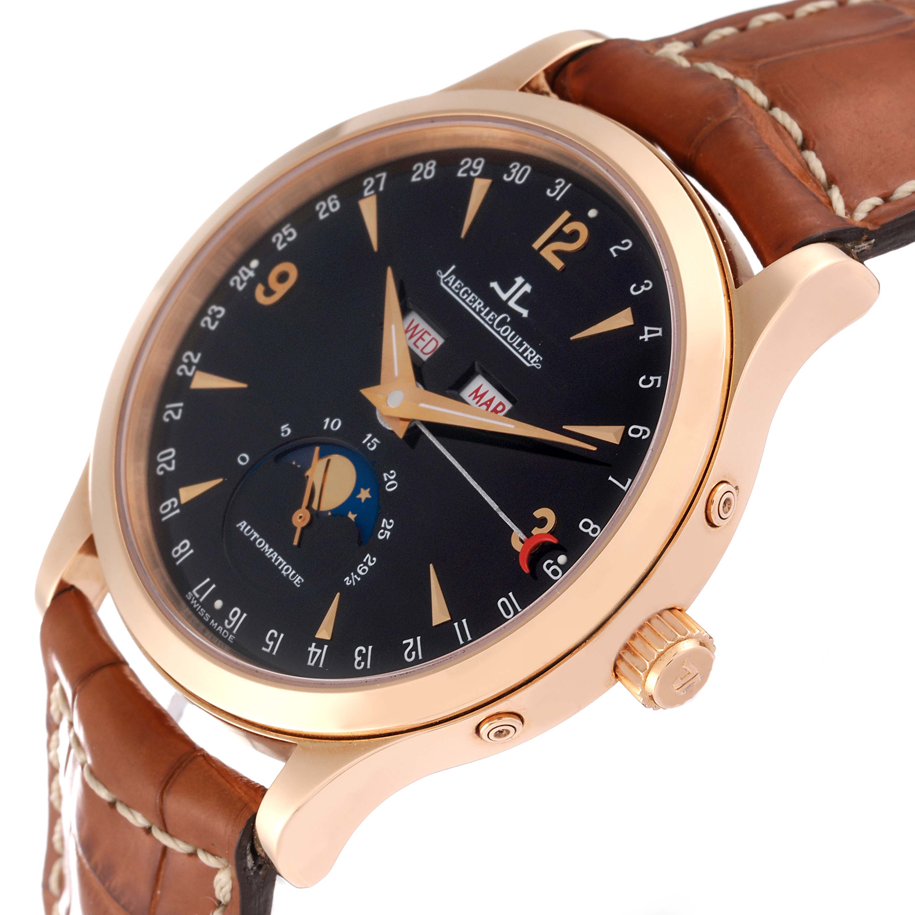 This image shows a Jaeger LeCoultre Master 140.240.987B Men's Rose Gold Black Dial 140.240.987B Men's Rose Gold Black Dial watch at an angle highlighting the rose gold case, black dial, and brown leather strap.