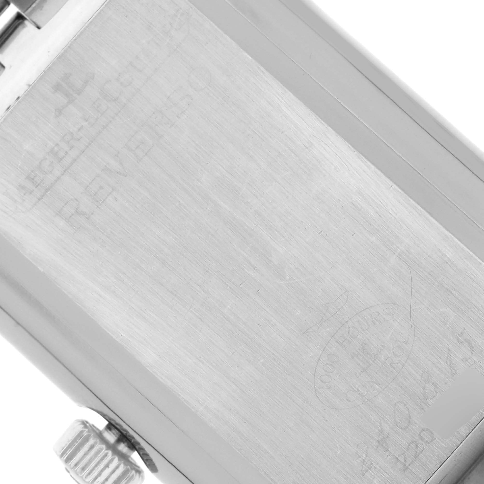 The image shows the back of a Jaeger LeCoultre Reverso Q3008120 Men's Stainless Steel Silver Dial Q3008120 Men's Stainless Steel Silver Dial watch, highlighting its brushed metal finish and engraving.