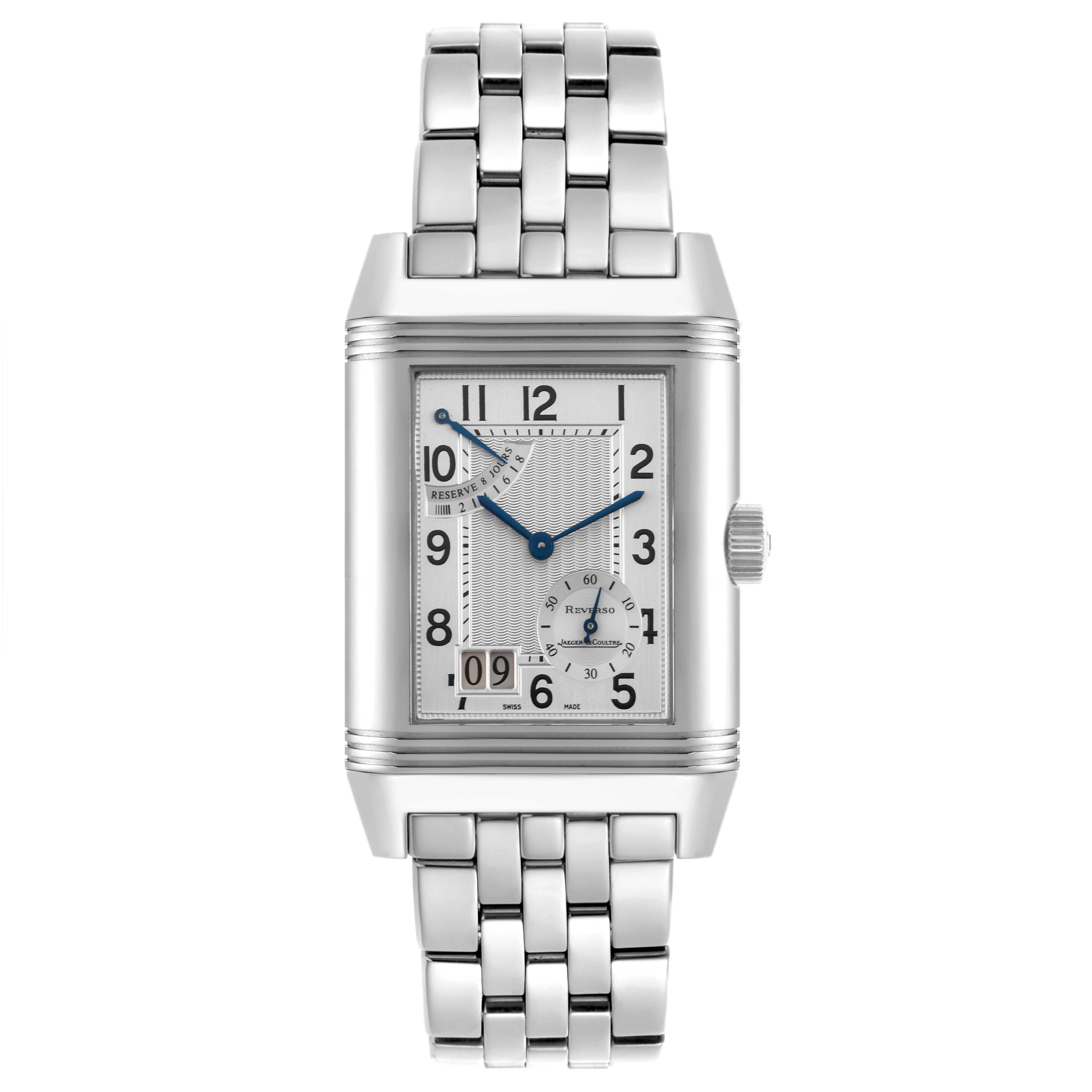 The Jaeger-LeCoultre Reverso watch is shown from a top-down angle, highlighting the face, case, and metal bracelet.