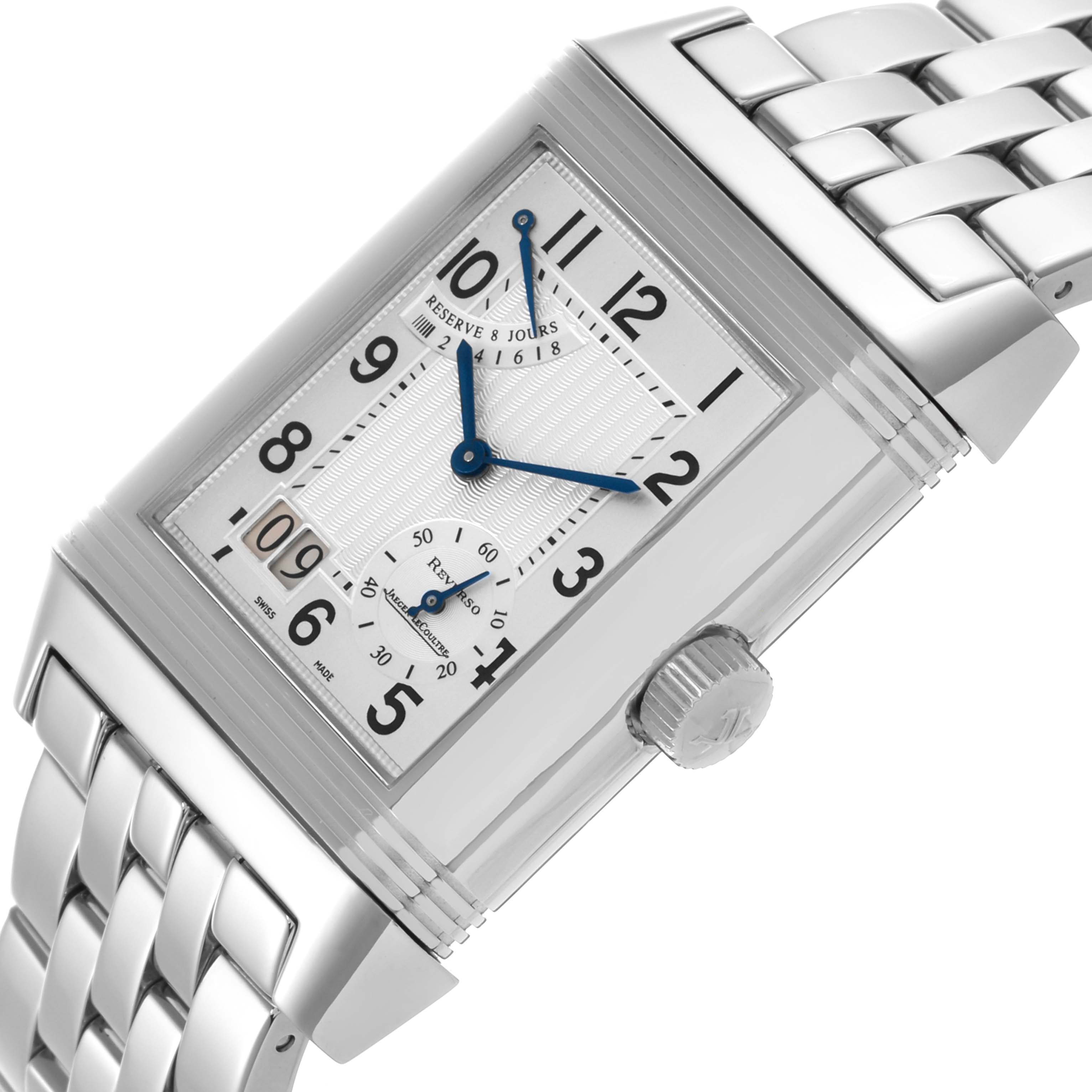 The Jaeger-LeCoultre Reverso watch is shown at an angled view, highlighting its rectangular face, crown, and linked metal bracelet.